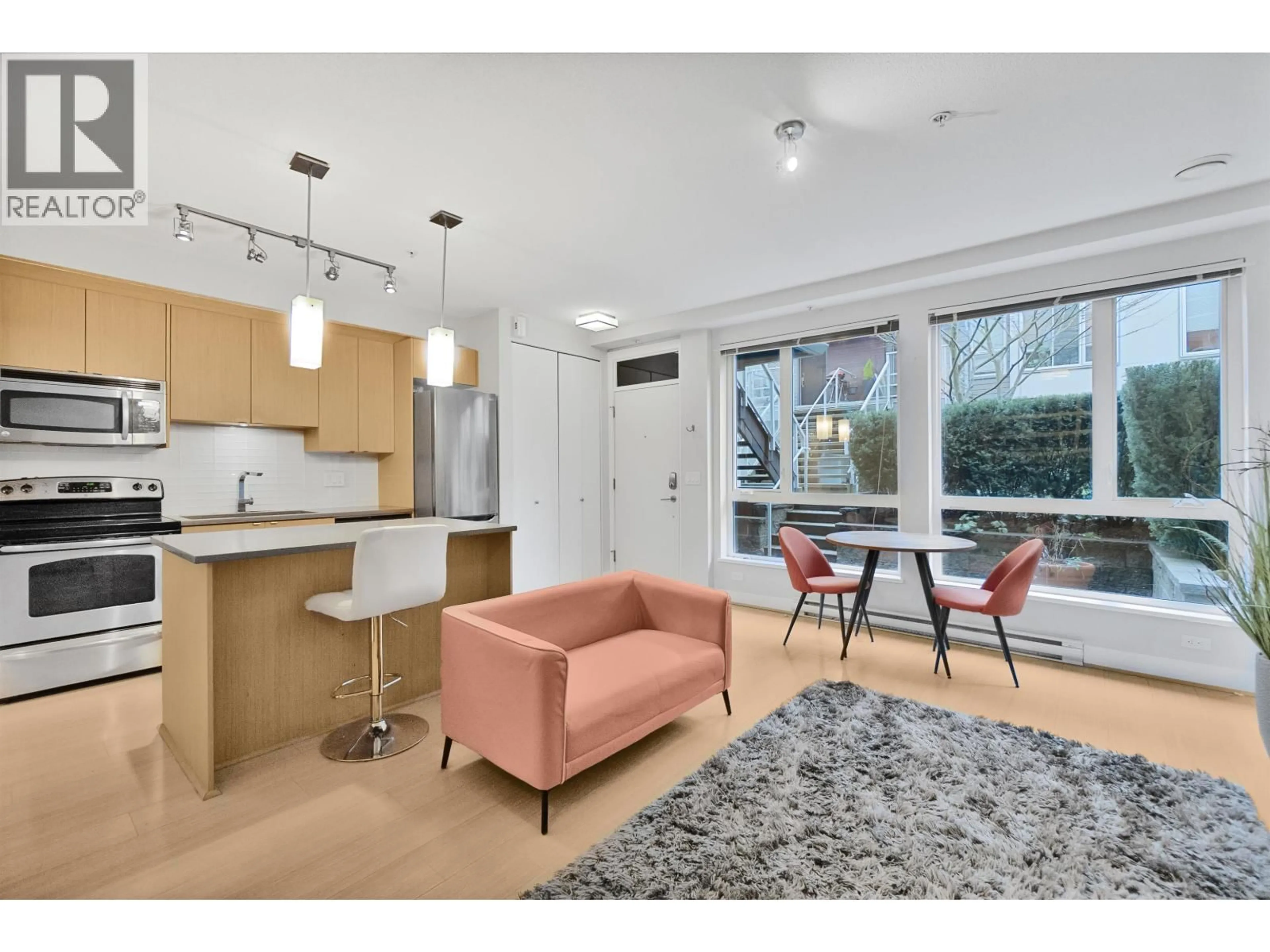 Open concept kitchen, unknown for 115 - 735 15TH STREET, North Vancouver British Columbia V7M0B8