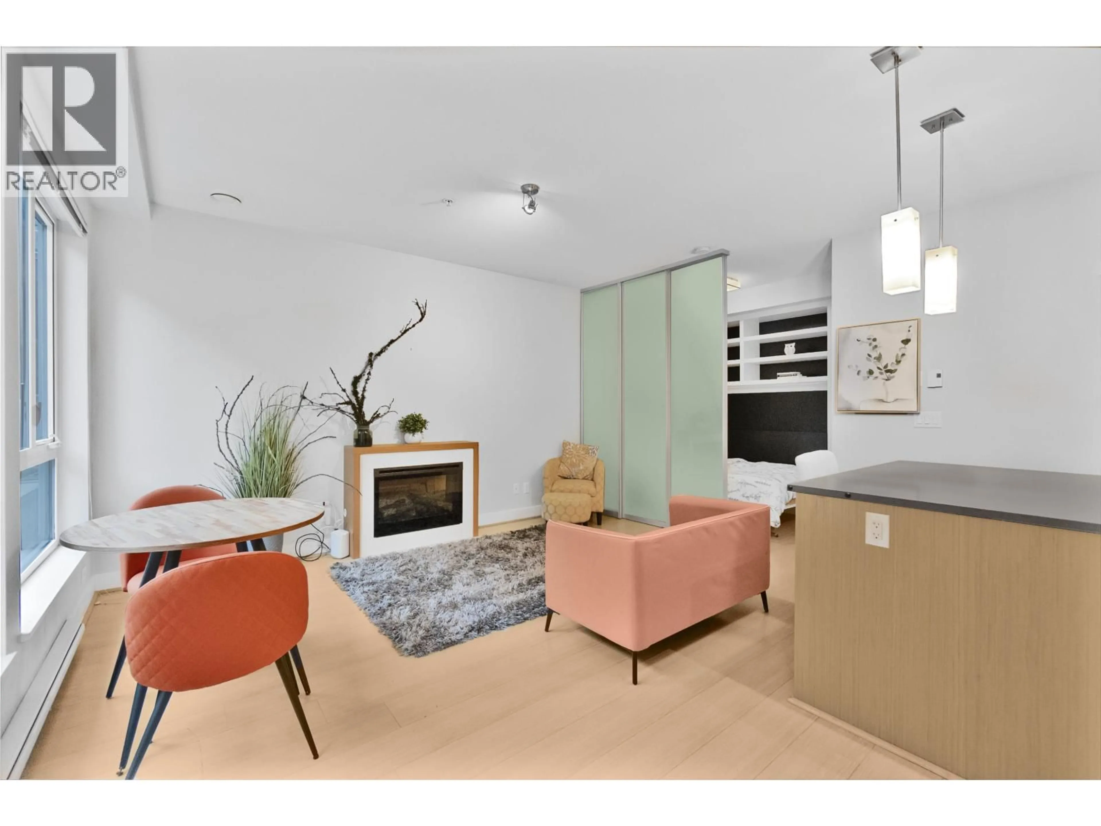 Living room with furniture, unknown for 115 - 735 15TH STREET, North Vancouver British Columbia V7M0B8