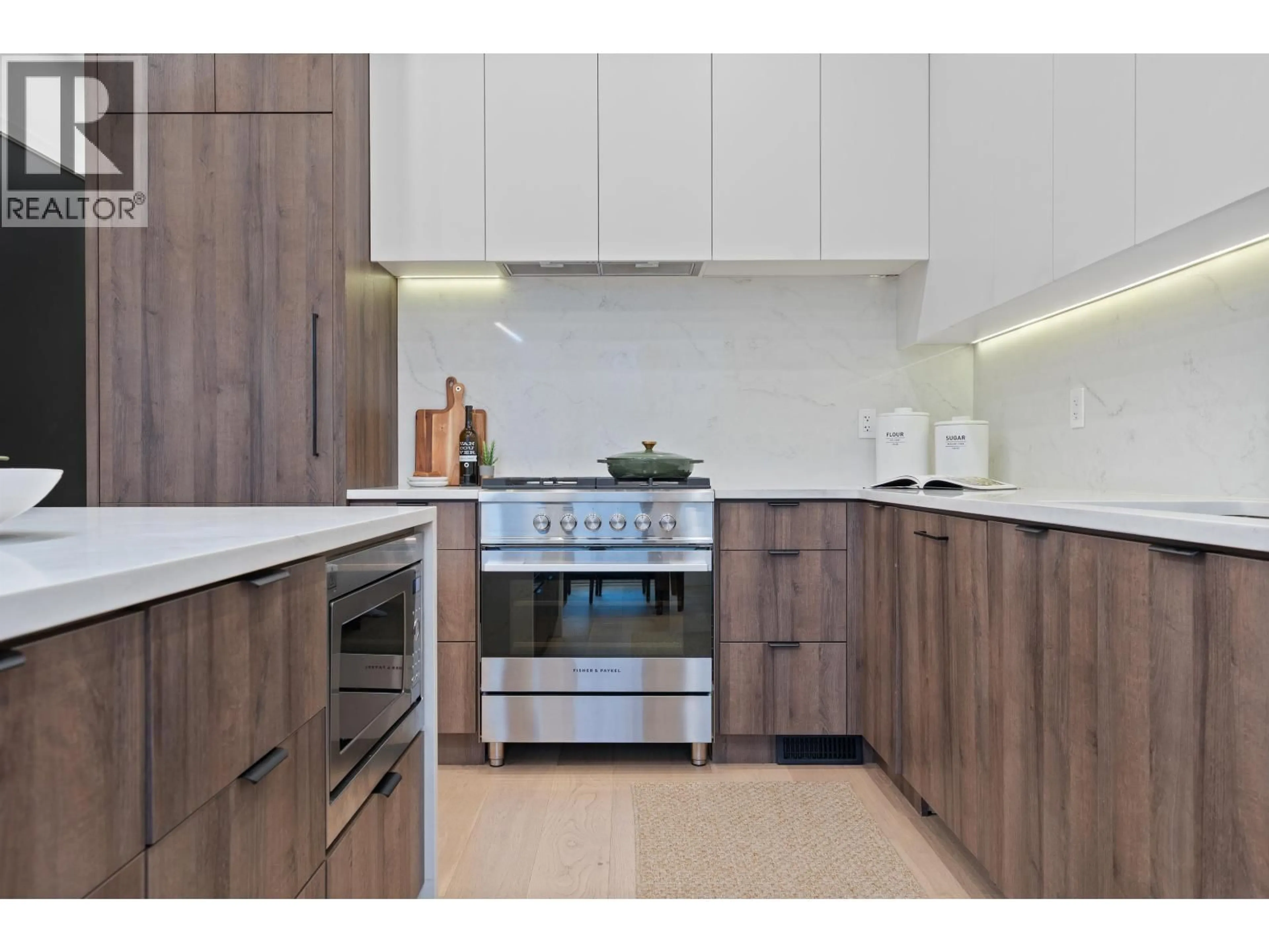 Contemporary kitchen, wood/laminate floor for 919 10TH AVENUE, Vancouver British Columbia V5T2B3