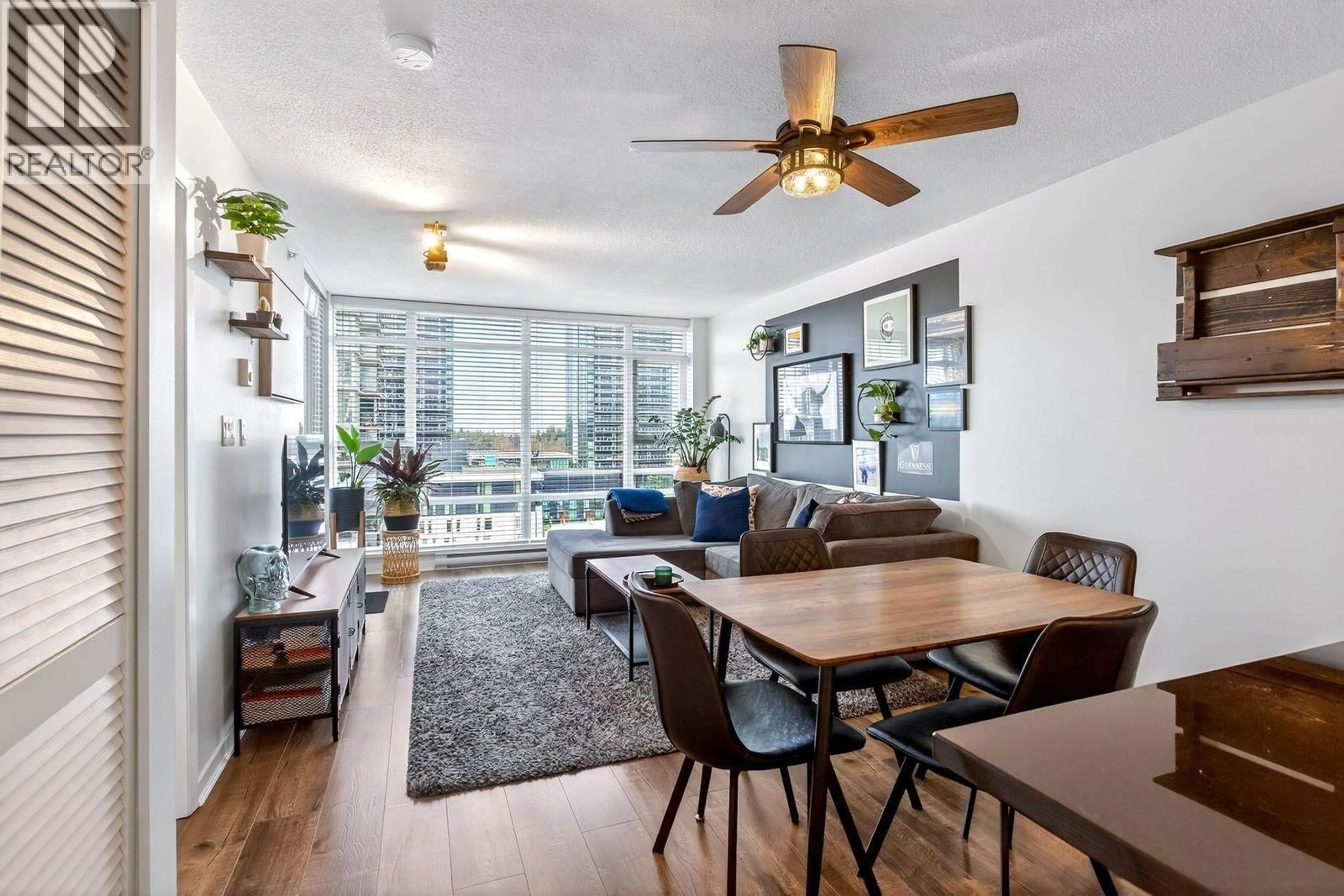 Living room with furniture, wood/laminate floor for 908 - 575 DELESTRE AVENUE, Coquitlam British Columbia V3K0A6