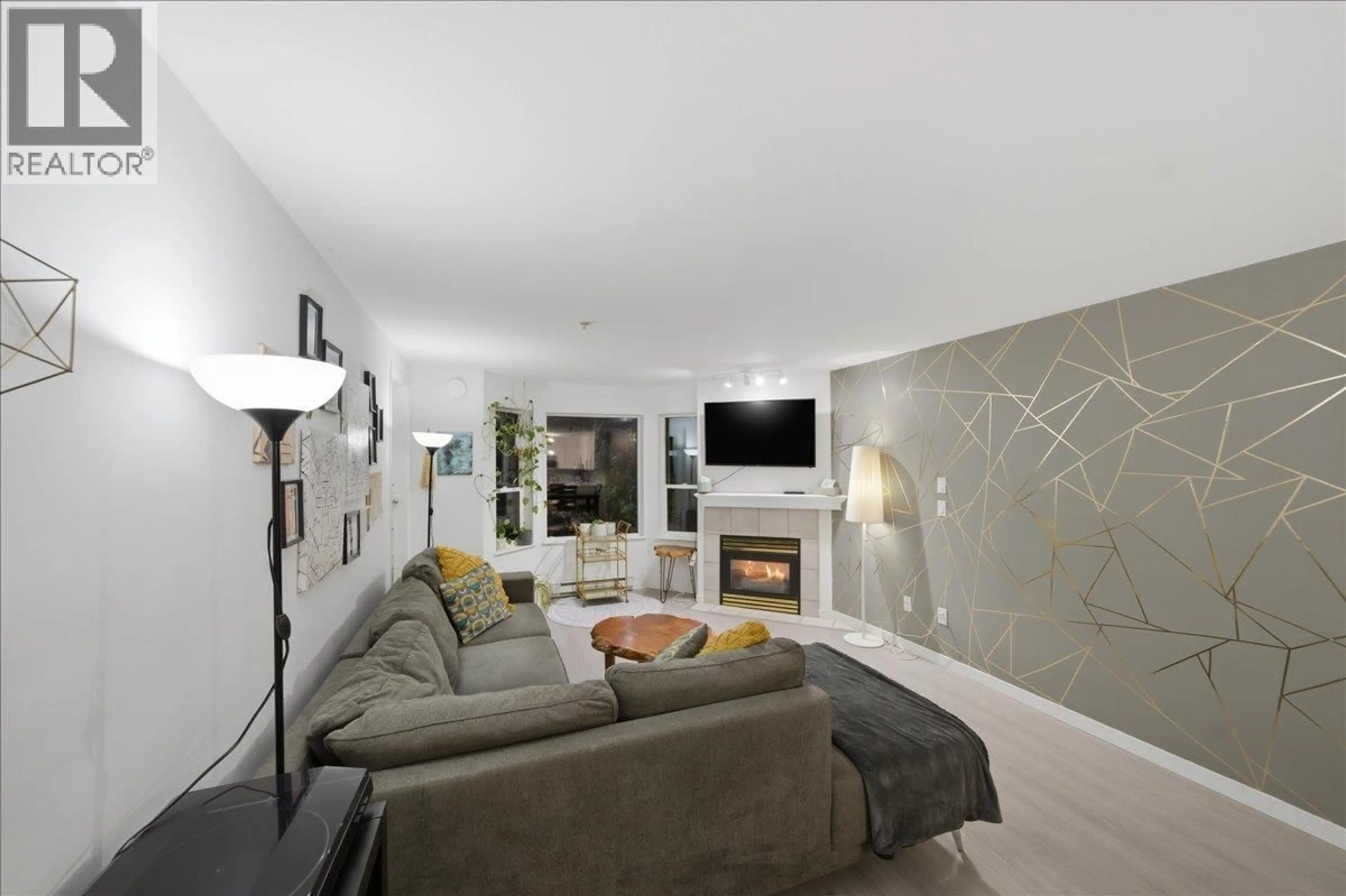 Living room with furniture, unknown for 311 - 121 SHORELINE CIRCLE, Port Moody British Columbia V3H5G2