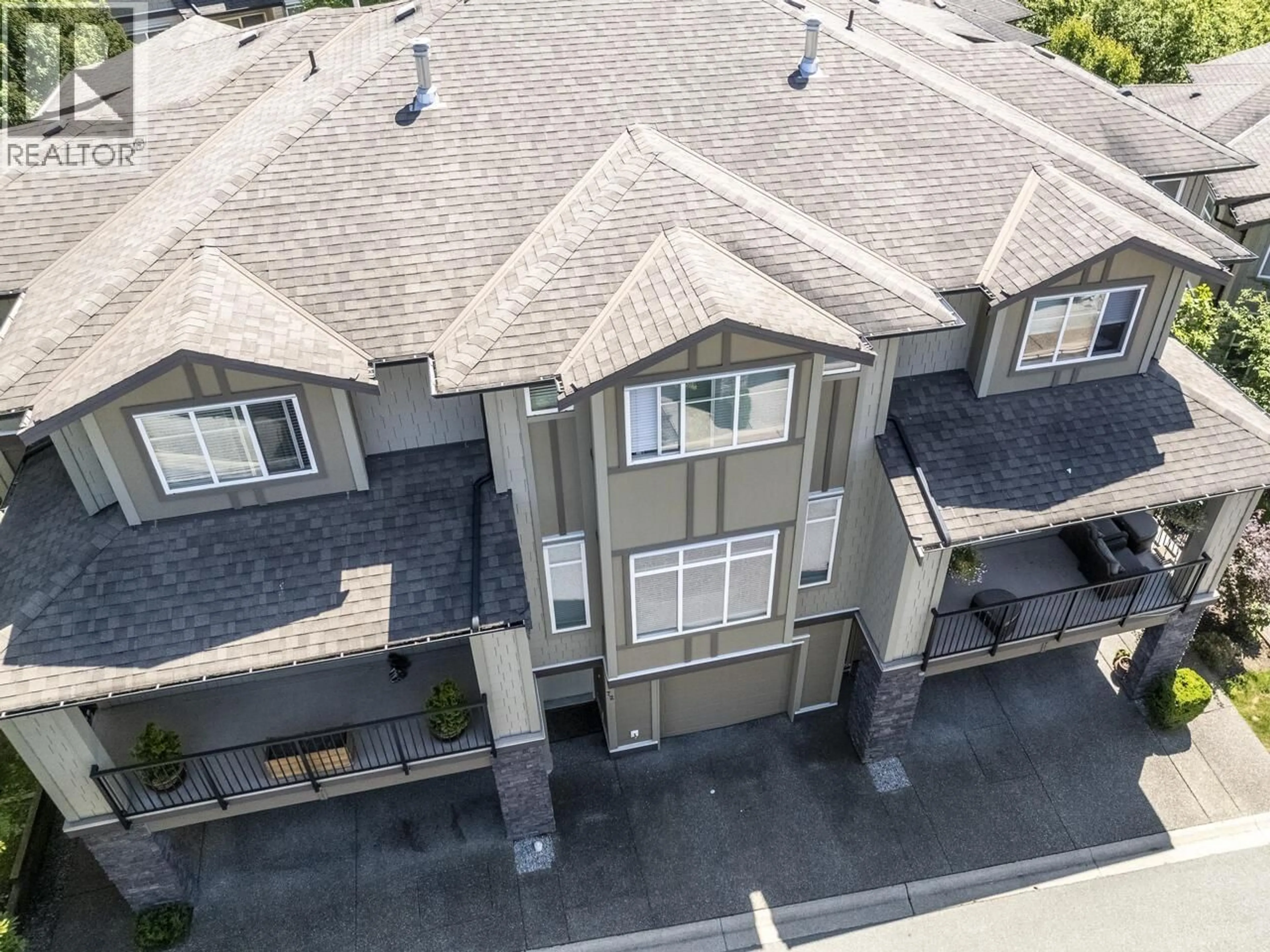 A pic from outside/outdoor area/front of a property/back of a property/a pic from drone, street for 72 - 22865 TELOSKY AVENUE, Maple Ridge British Columbia V2X8Z9