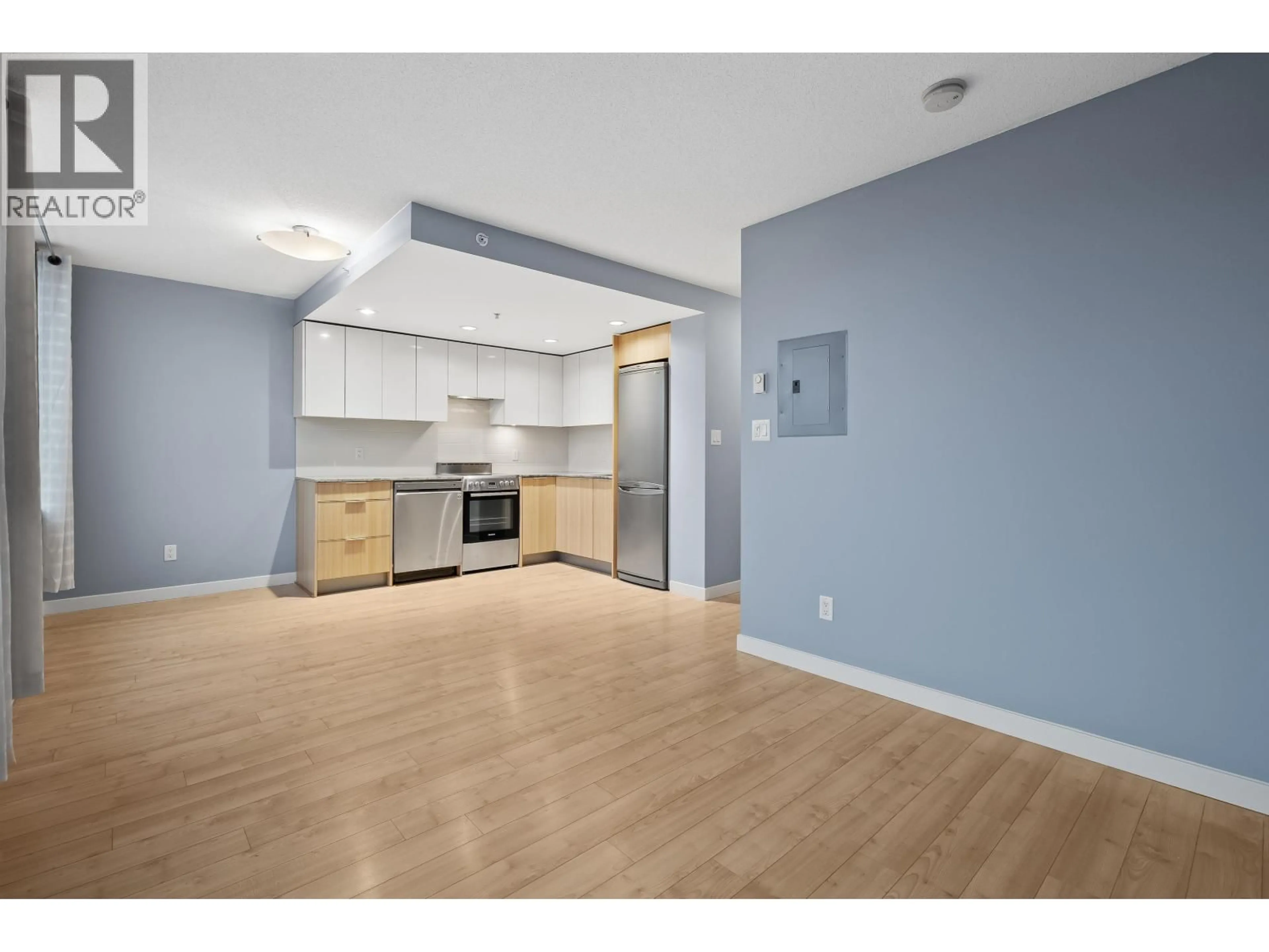 Open concept kitchen, wood/laminate floor for 512 - 445 2ND AVENUE, Vancouver British Columbia V5Y0E8