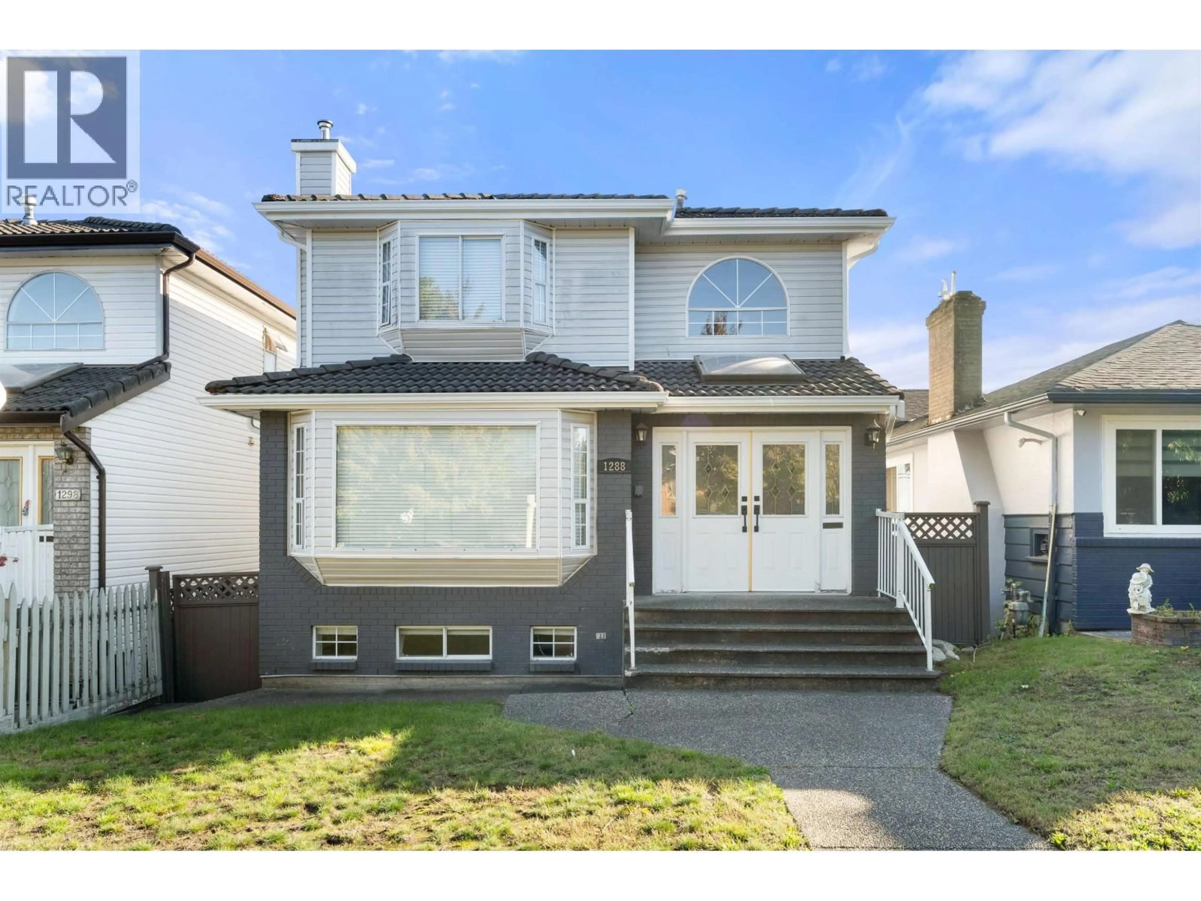 Home with vinyl exterior material, street for 1288 59TH AVENUE, Vancouver British Columbia V5X1Y9
