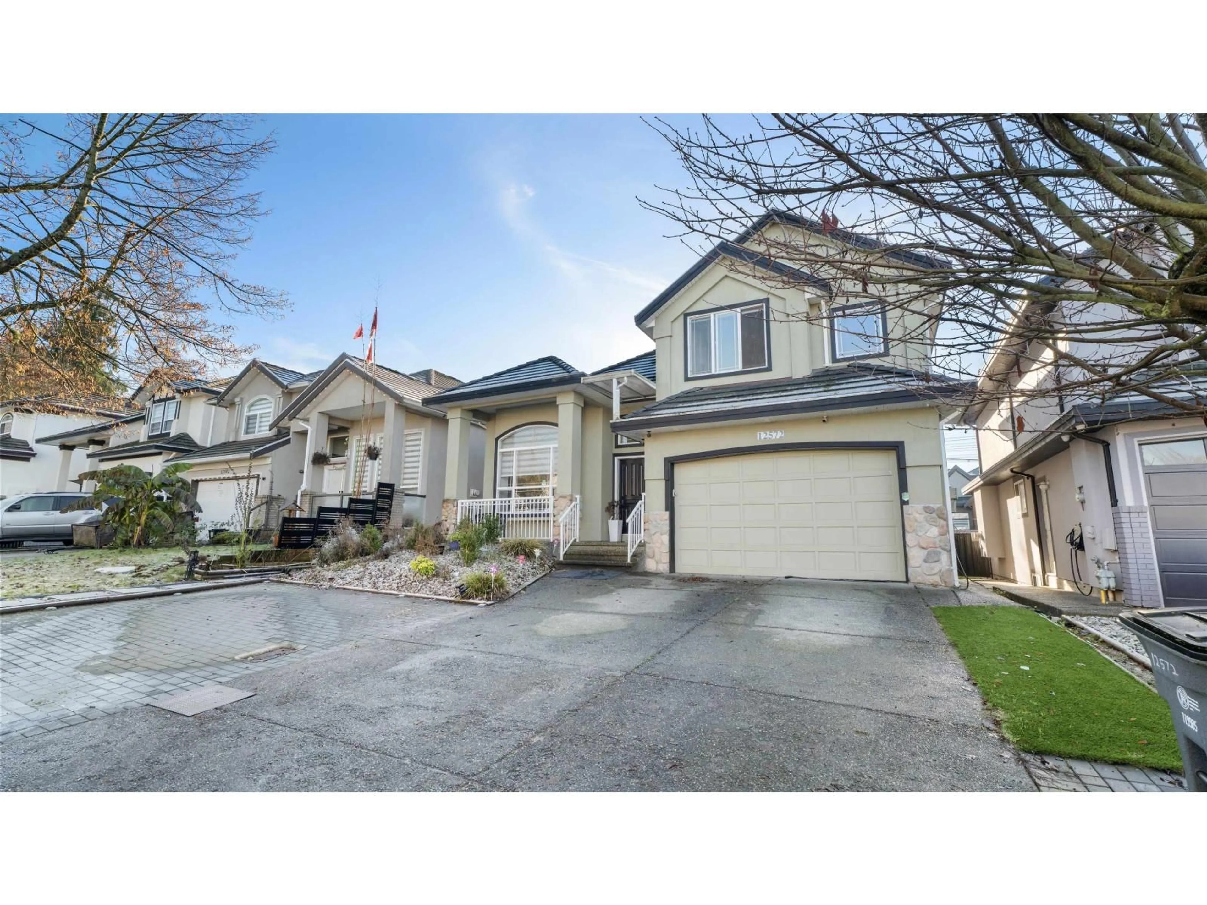 Home with vinyl exterior material, street for 12572 62B AVENUE, Surrey British Columbia V3X3M9