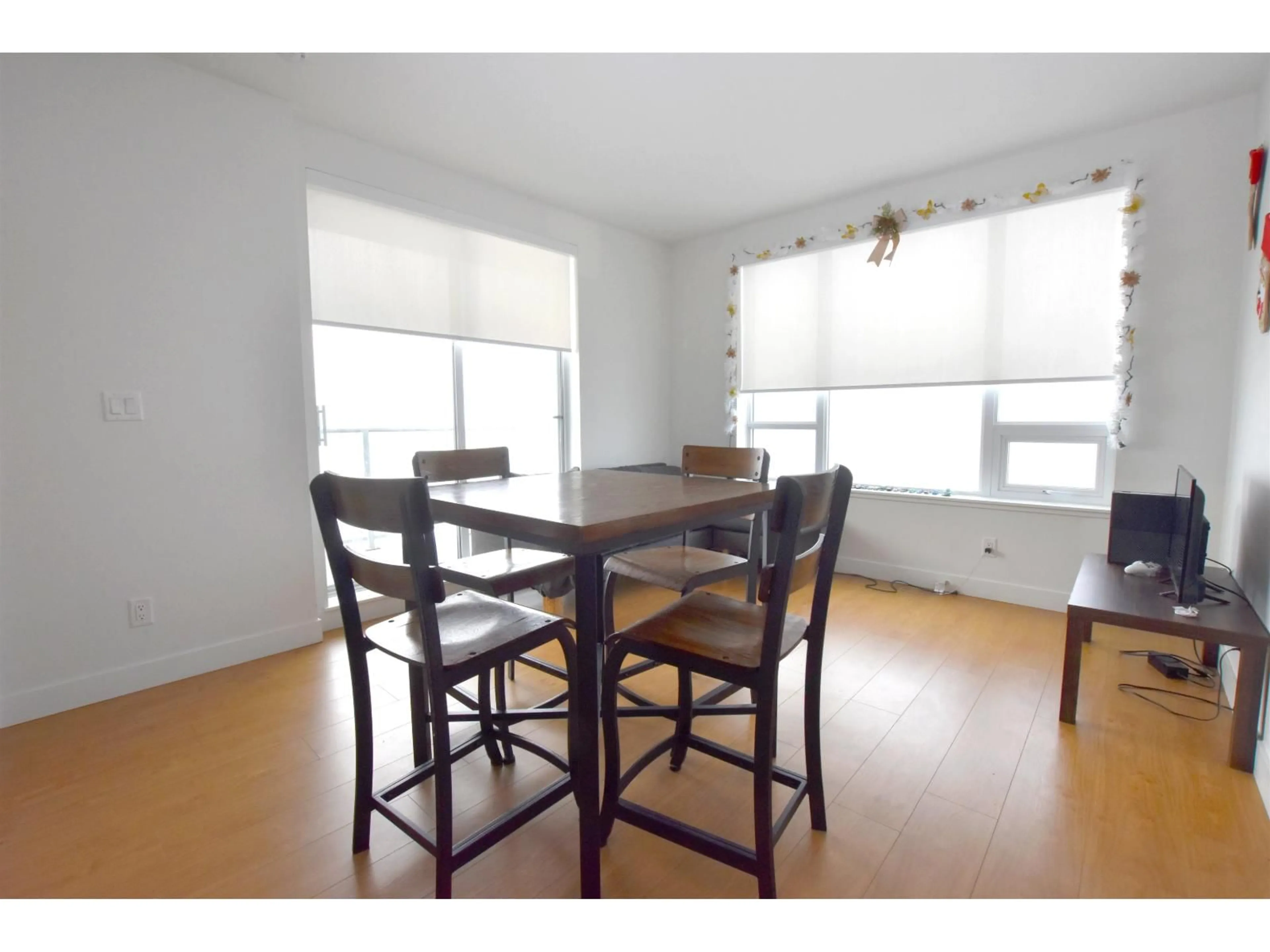 Dining room, wood/laminate floor for 2407 - 13359 OLD YALE ROAD, Surrey British Columbia V3T0S4