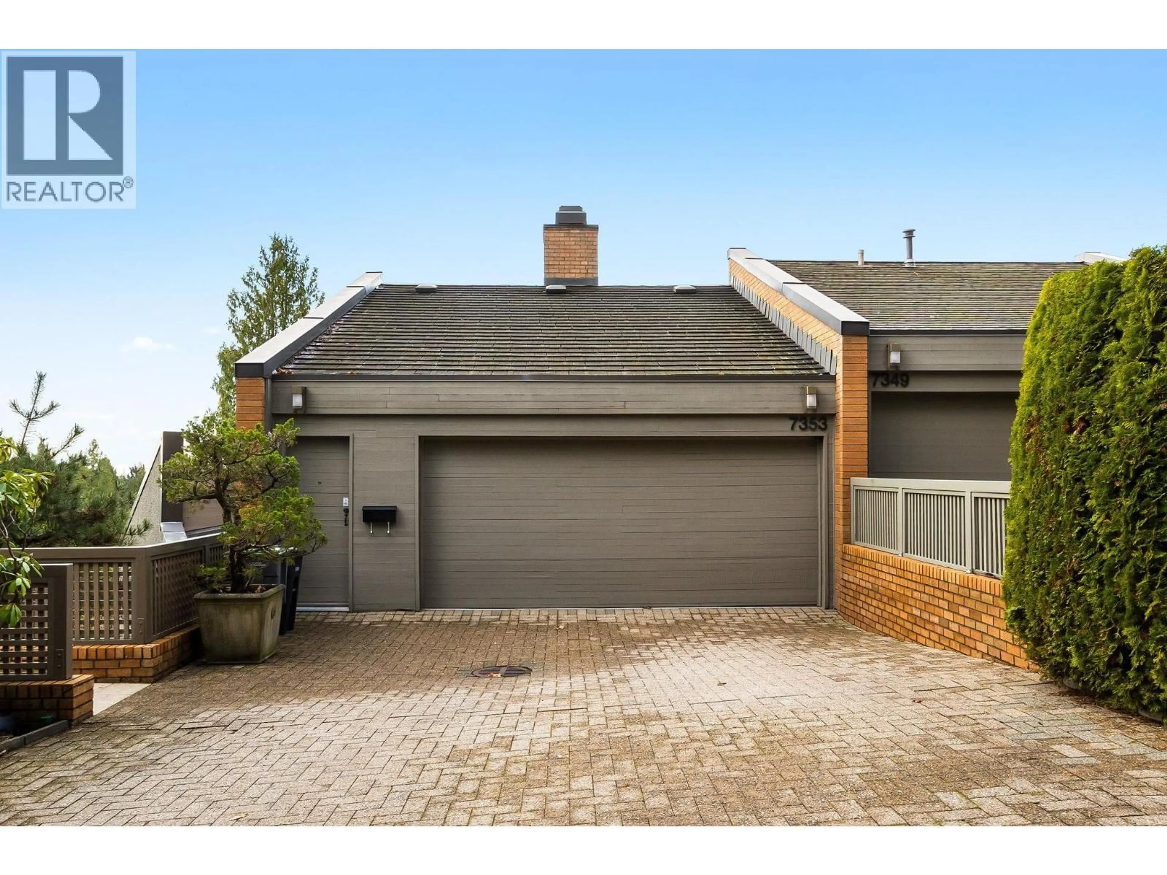 Home with brick exterior material, street for 7353 YEW STREET, Vancouver British Columbia V6P5W4