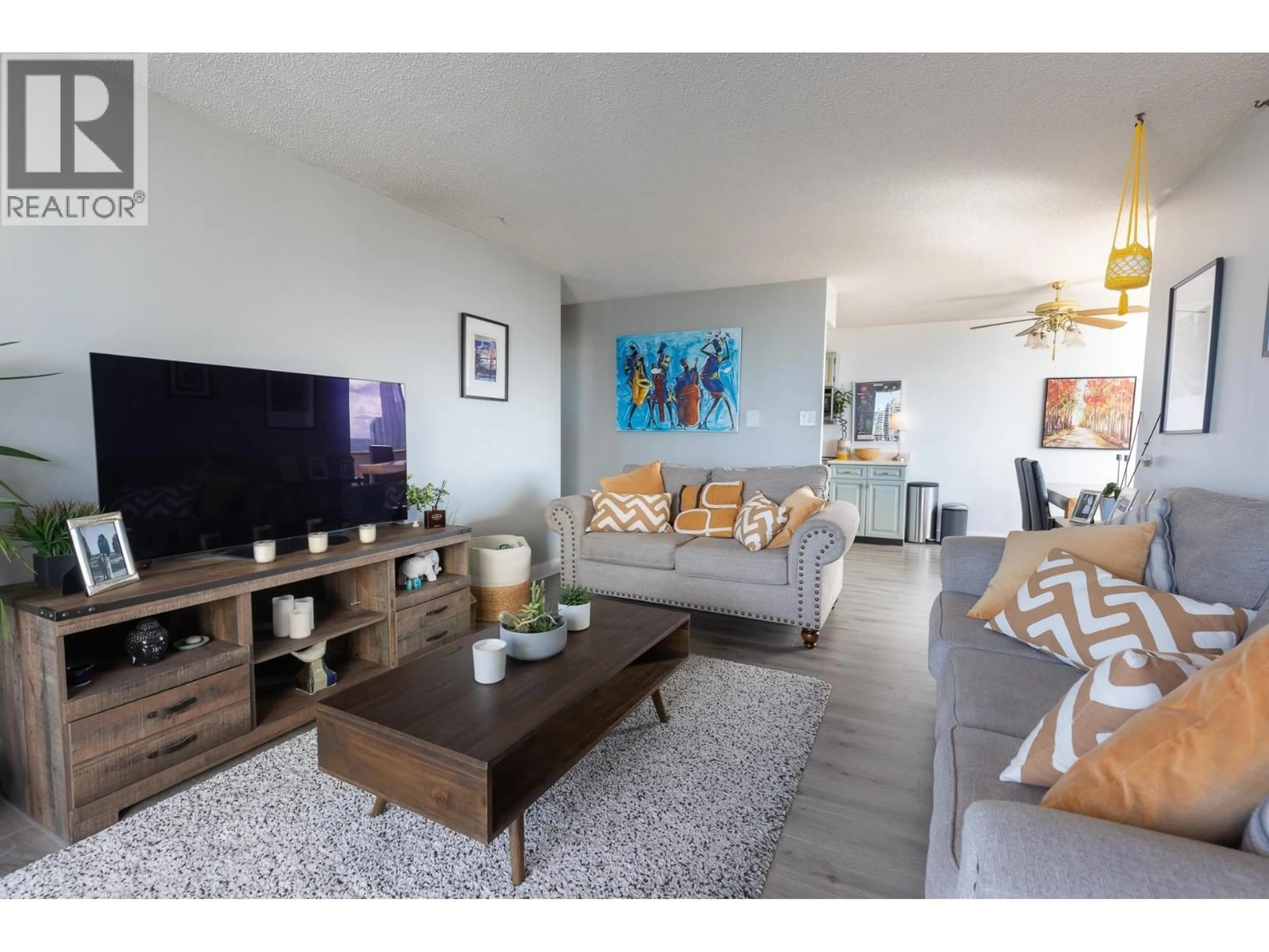 Living room with furniture, wood/laminate floor for 1404 - 7235 SALISBURY AVENUE, Burnaby British Columbia V5E4E6