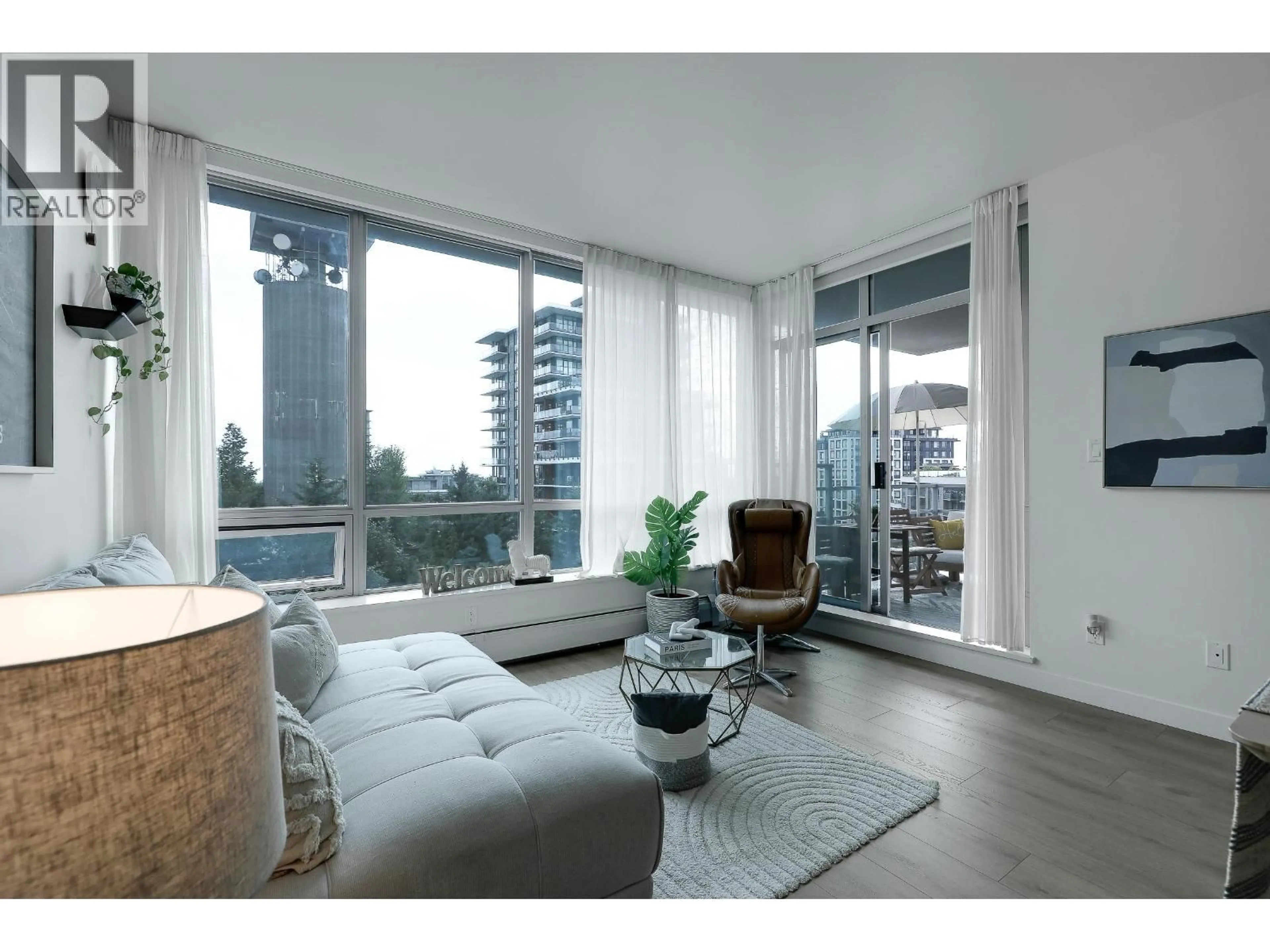 Living room with furniture, unknown for 803 - 9060 UNIVERSITY CRESCENT, Burnaby British Columbia V5A0E1