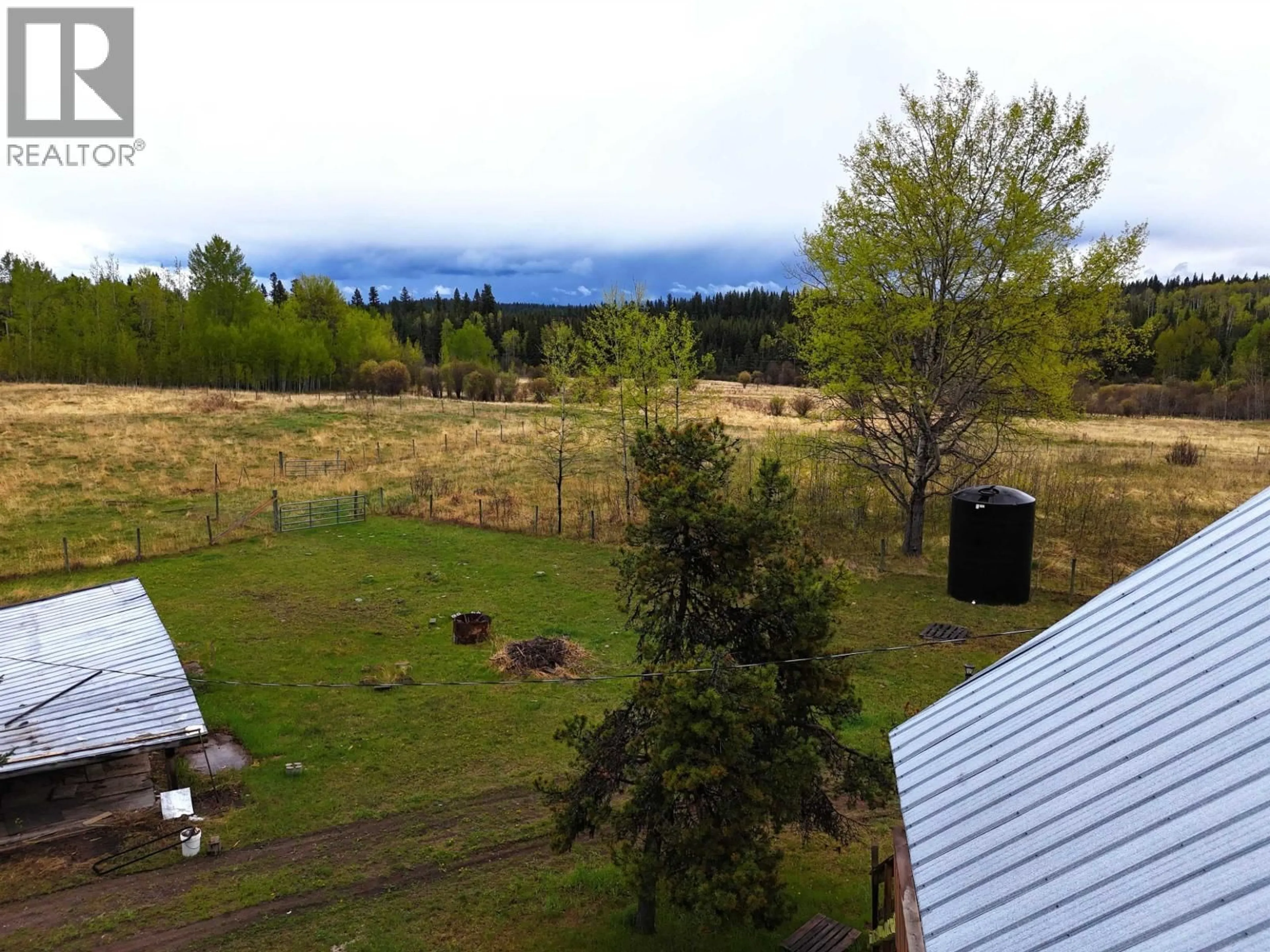 A pic from outside/outdoor area/front of a property/back of a property/a pic from drone, unknown for 3074 SPOUT LAKE ROAD, Lac La Hache British Columbia V0K1T0