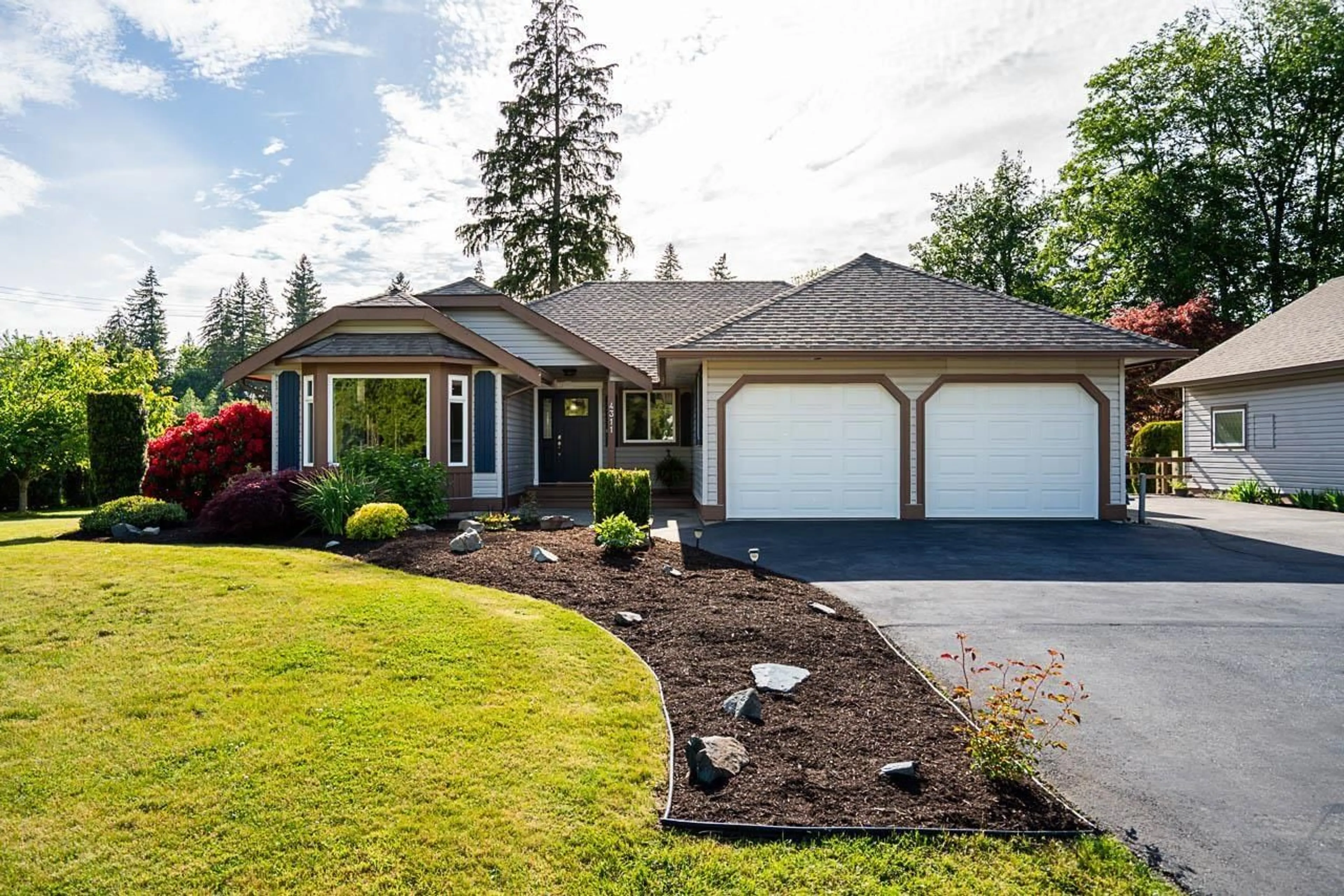 Home with vinyl exterior material, street for 4311 247 STREET, Langley British Columbia V2Z2L8
