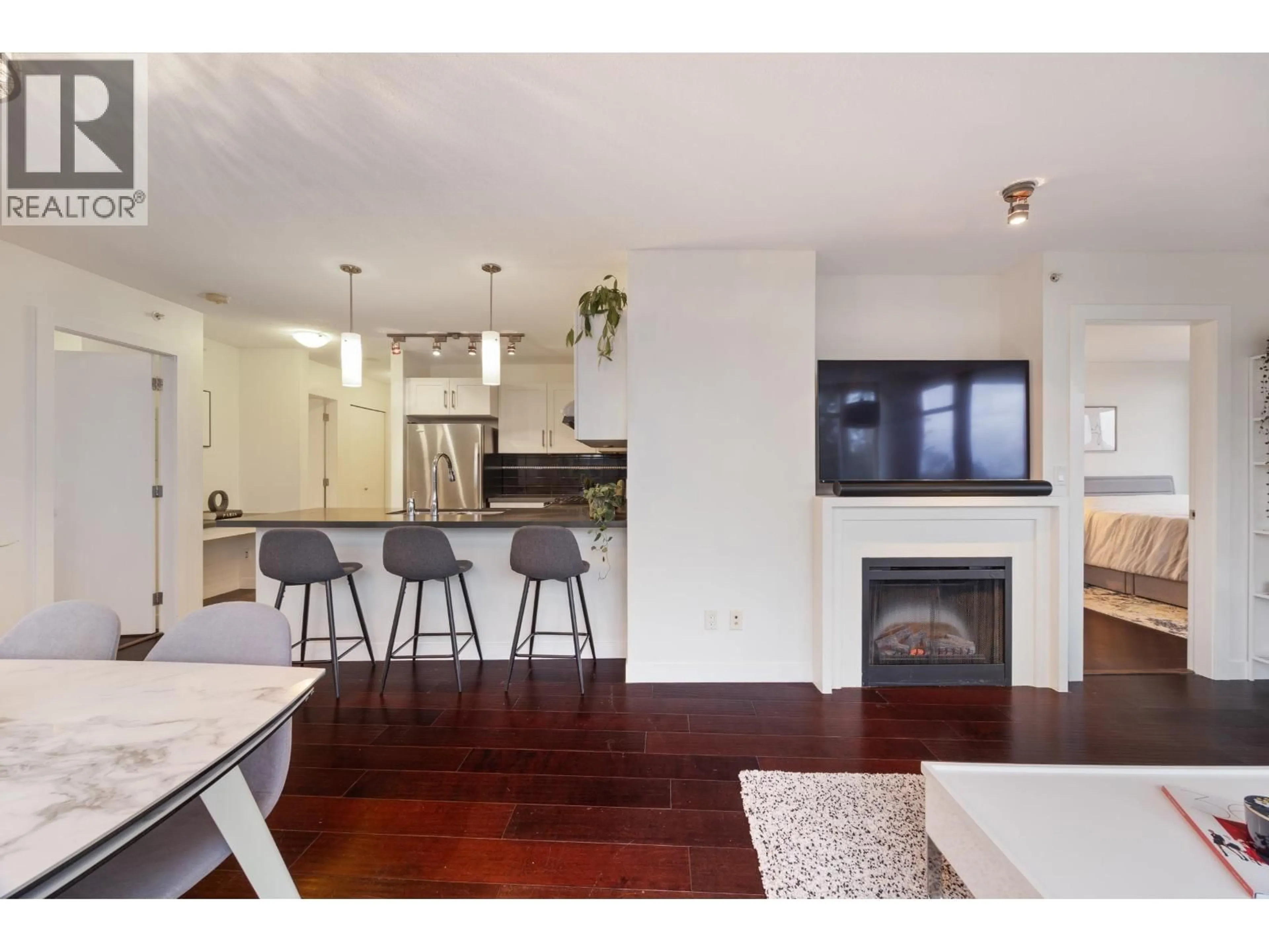 Open concept kitchen, wood/laminate floor for 907 - 7090 EDMONDS STREET, Burnaby British Columbia V3N0C6