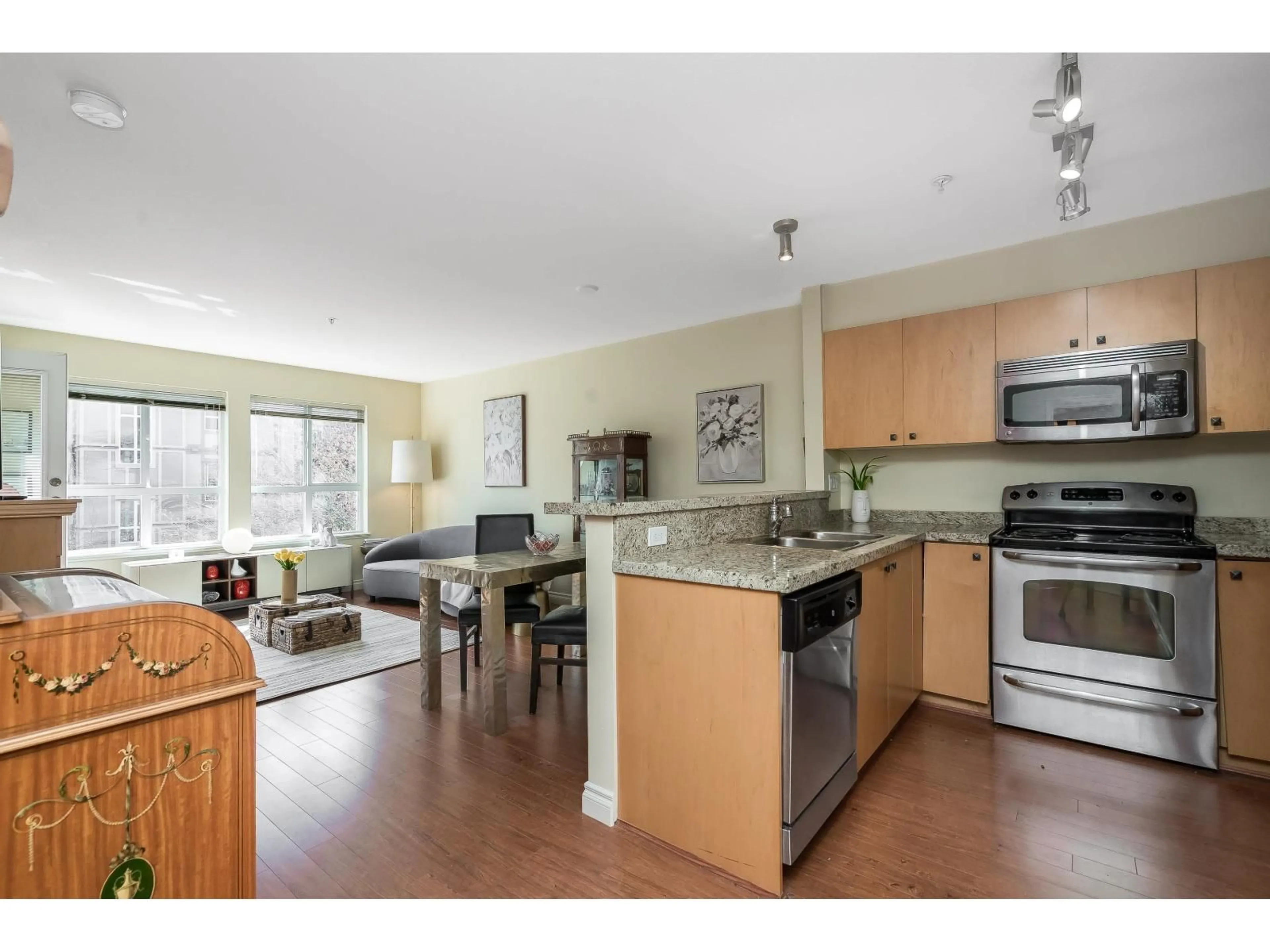 Open concept kitchen, wood/laminate floor for 412 - 8717 160 STREET, Surrey British Columbia V4N5X7