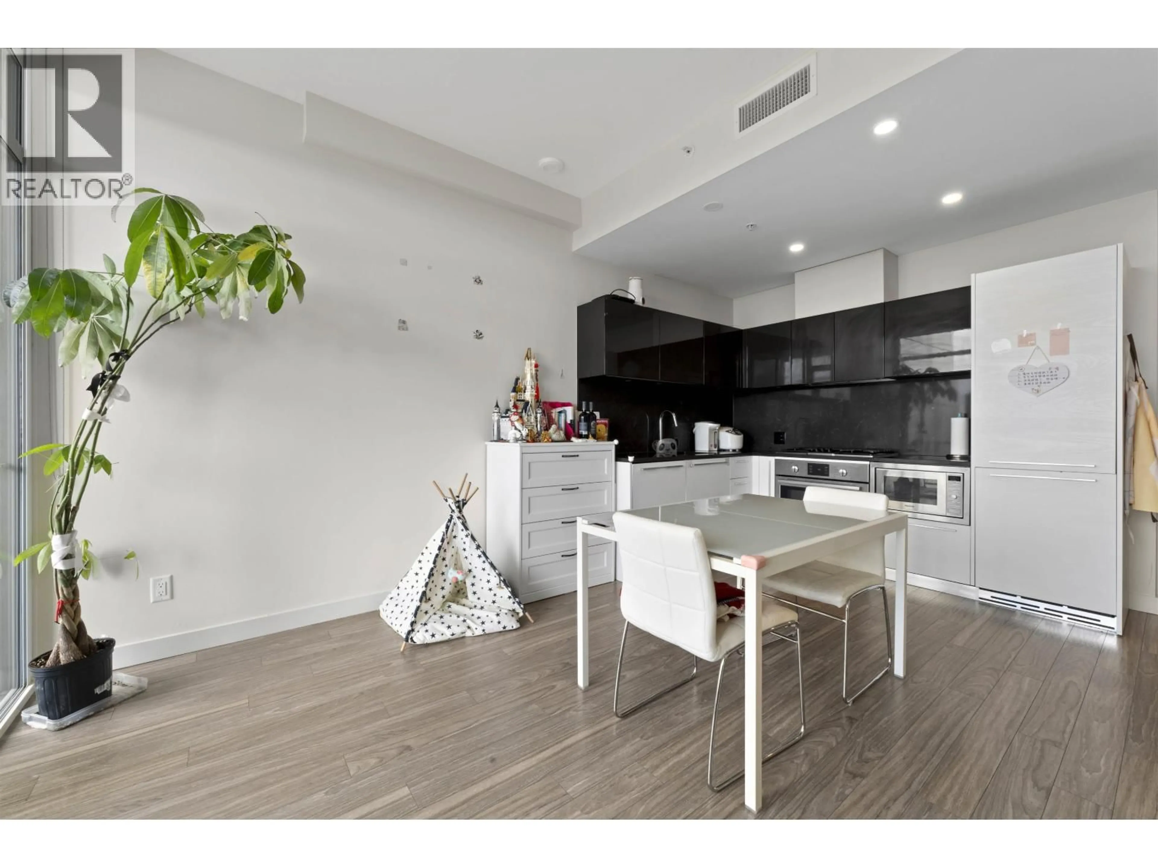 Open concept kitchen, wood/laminate floor for 1206 - 6288 CASSIE AVENUE, Burnaby British Columbia V5H0H7