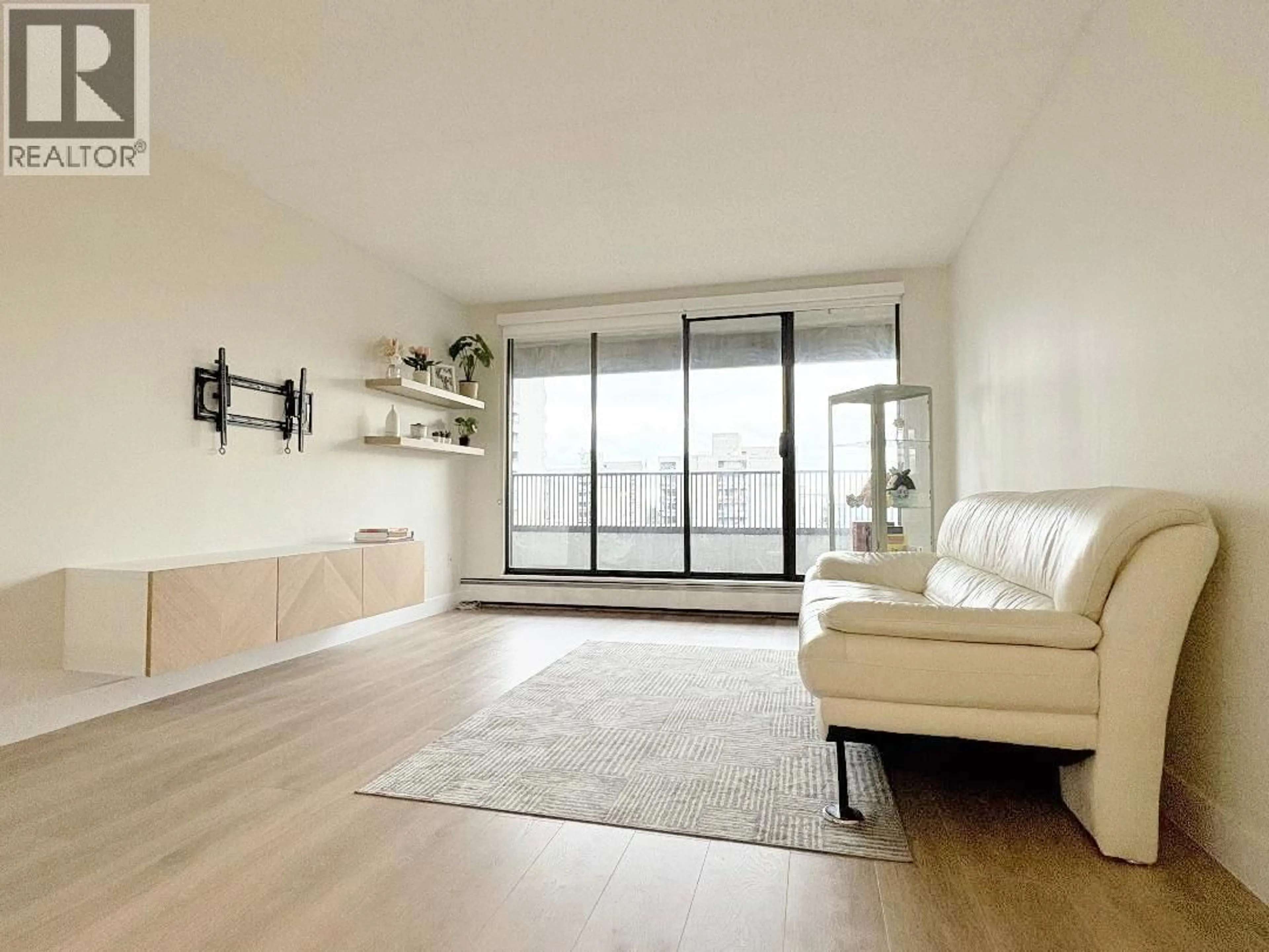 Living room with furniture, wood/laminate floor for 1006 - 4194 MAYWOOD STREET, Burnaby British Columbia V5H4E9