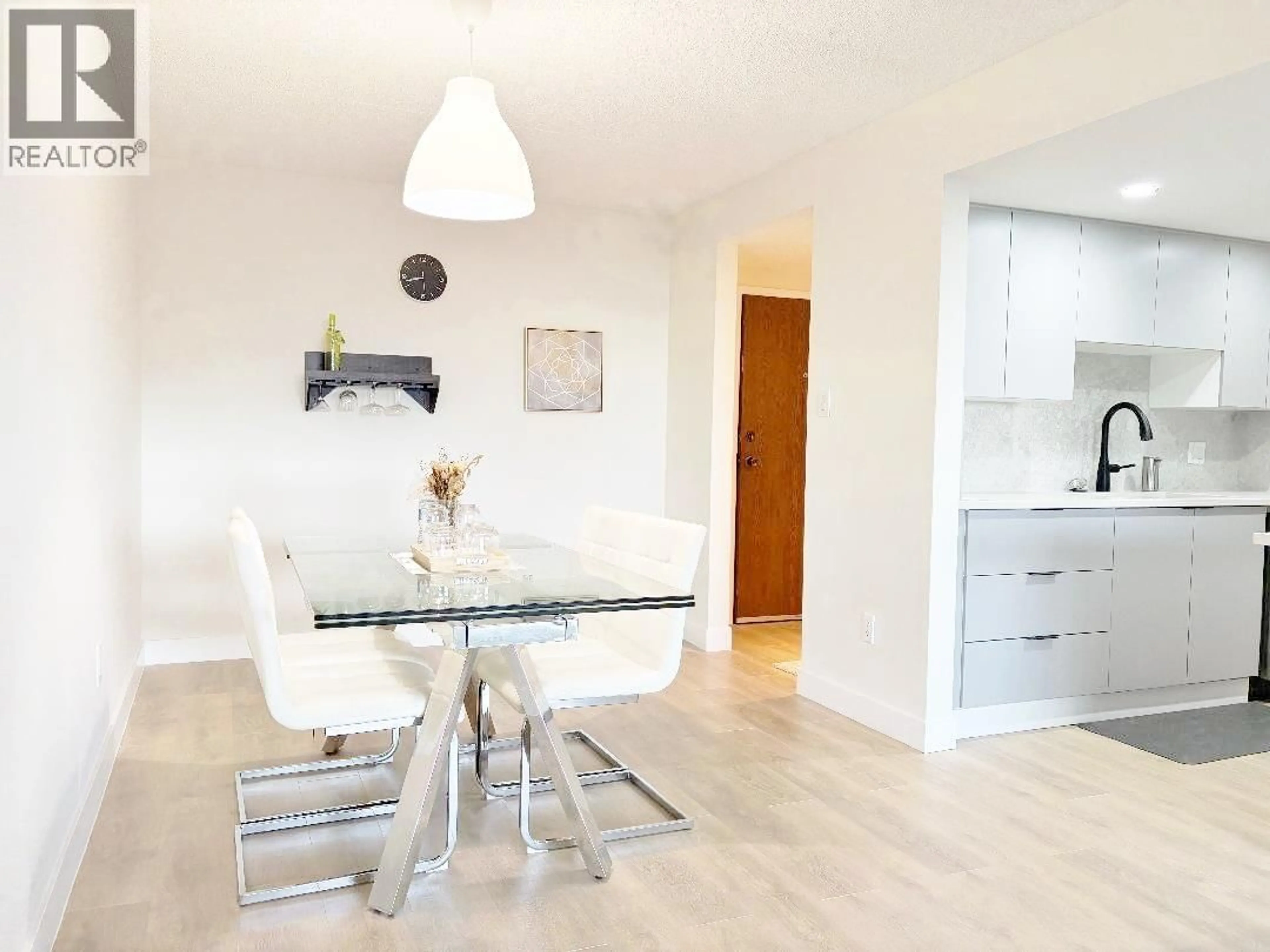 Dining room, wood/laminate floor for 1006 - 4194 MAYWOOD STREET, Burnaby British Columbia V5H4E9