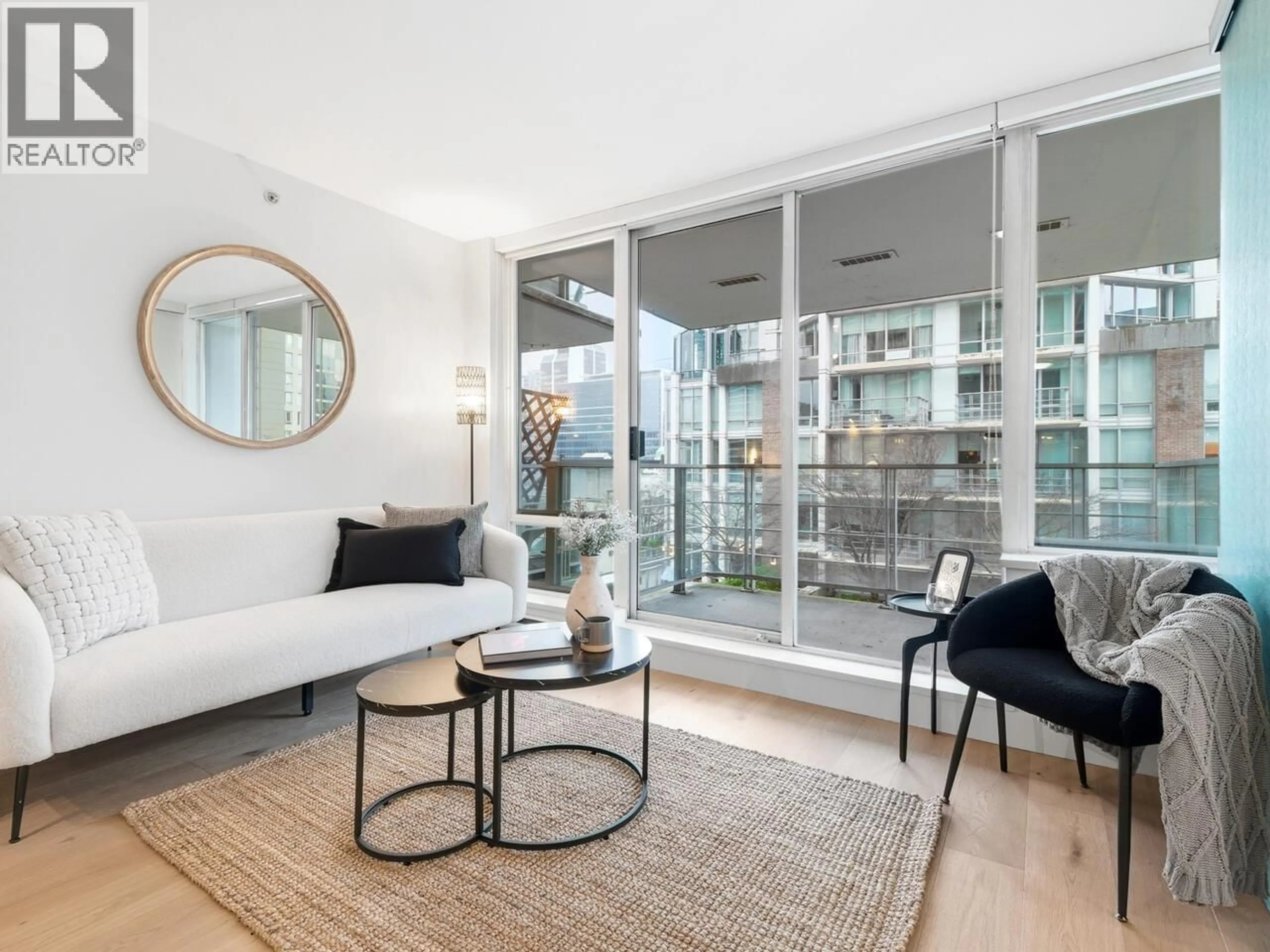 Living room with furniture, unknown for 701 - 535 SMITHE STREET, Vancouver British Columbia V6B0H2