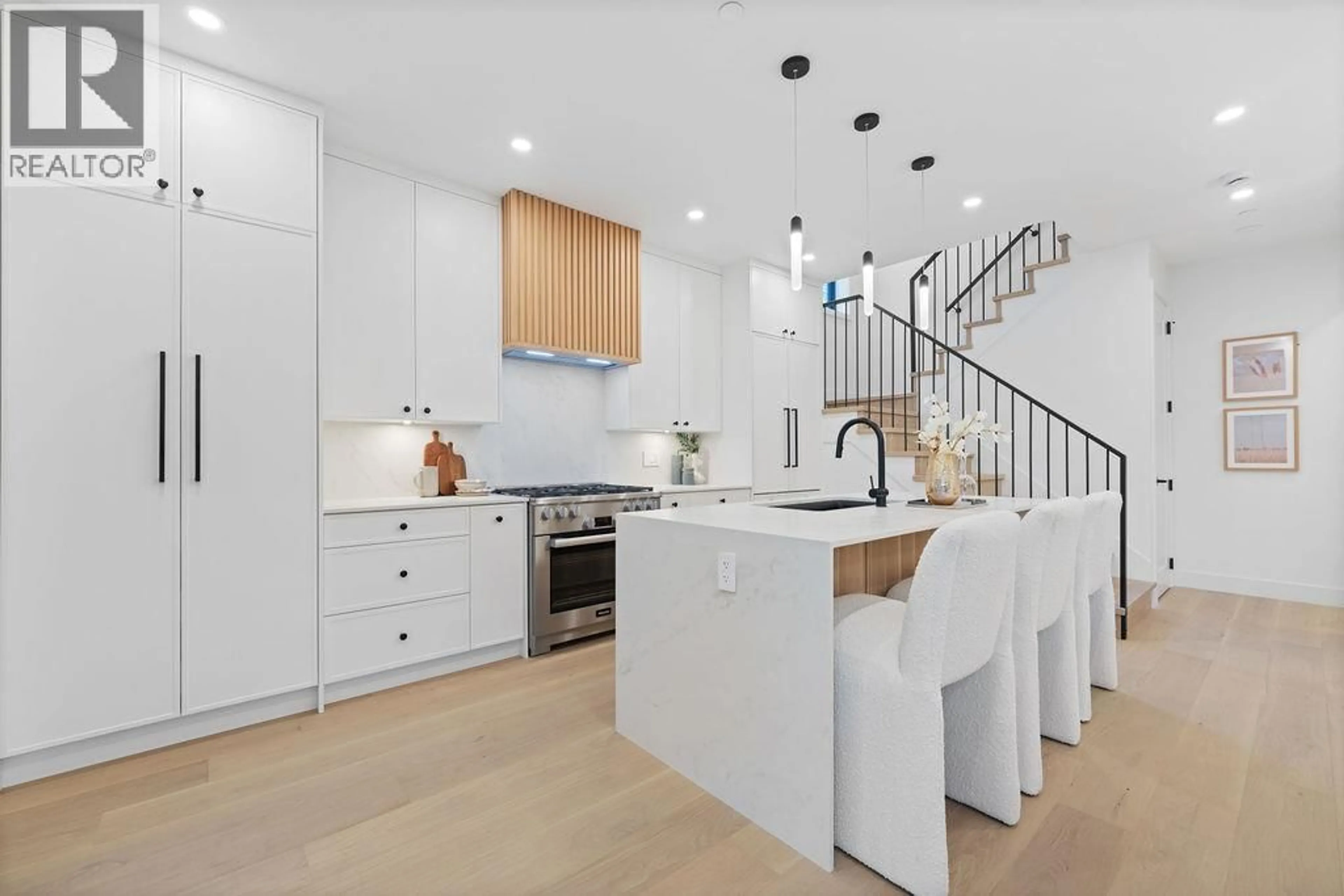 Open concept kitchen, ceramic/tile floor for 1 - 2846 12TH AVENUE, Vancouver British Columbia V6K2P9