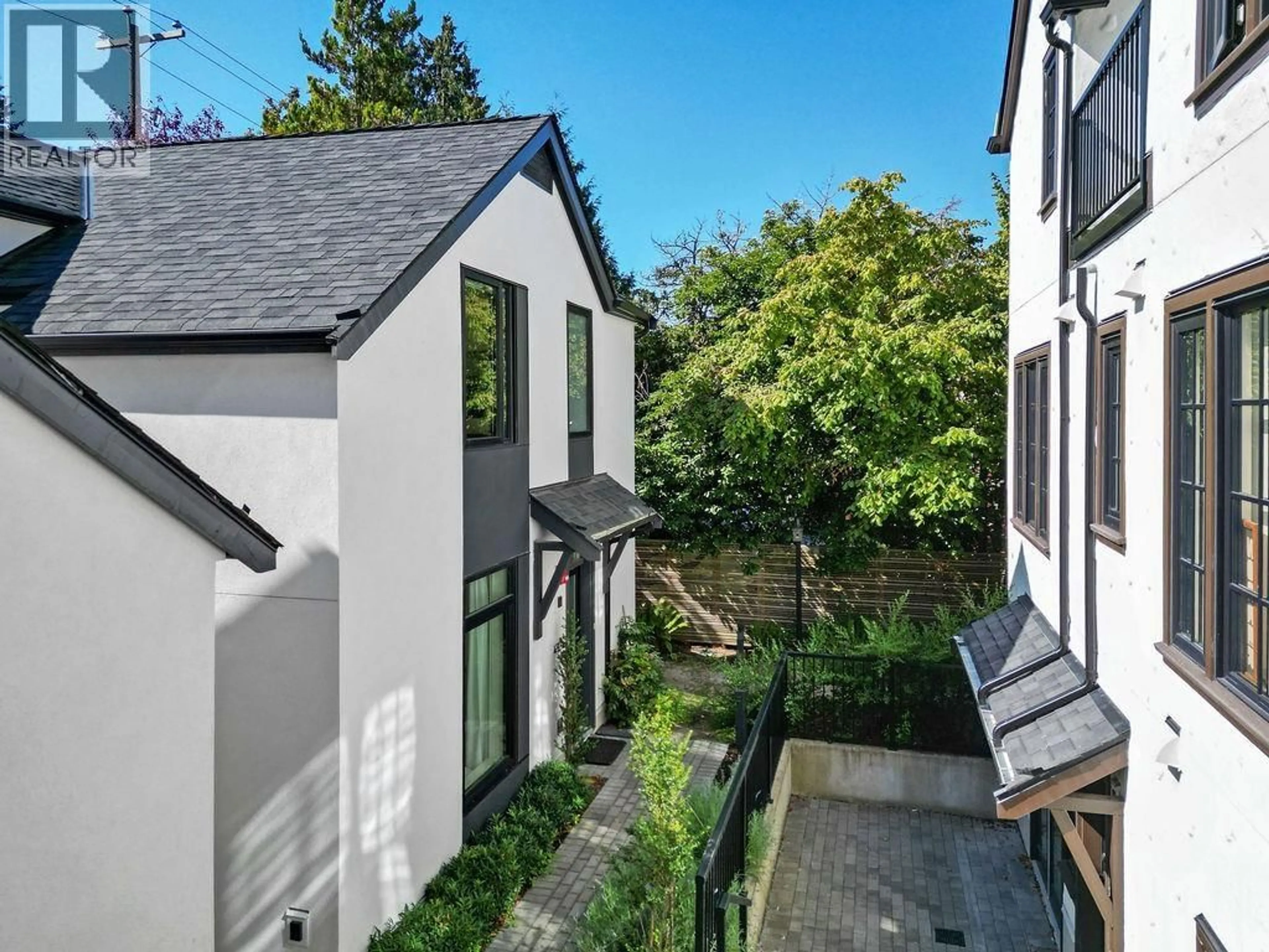 A pic from outside/outdoor area/front of a property/back of a property/a pic from drone, street for 4921 LARCH STREET, Vancouver British Columbia V6N0C8