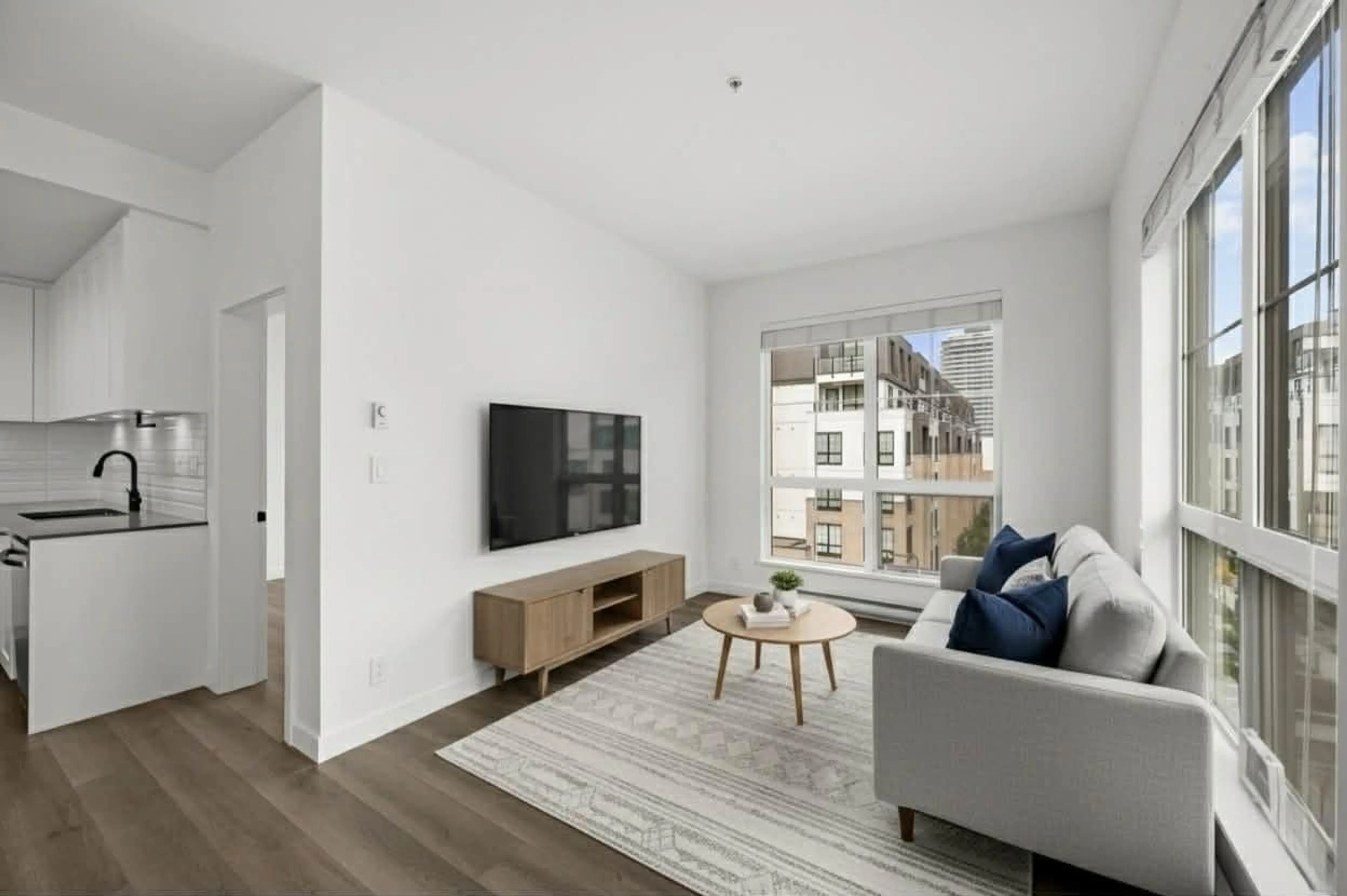 Living room with furniture, wood/laminate floor for 403 - 20052 83A AVENUE, Langley British Columbia V2Y3P4