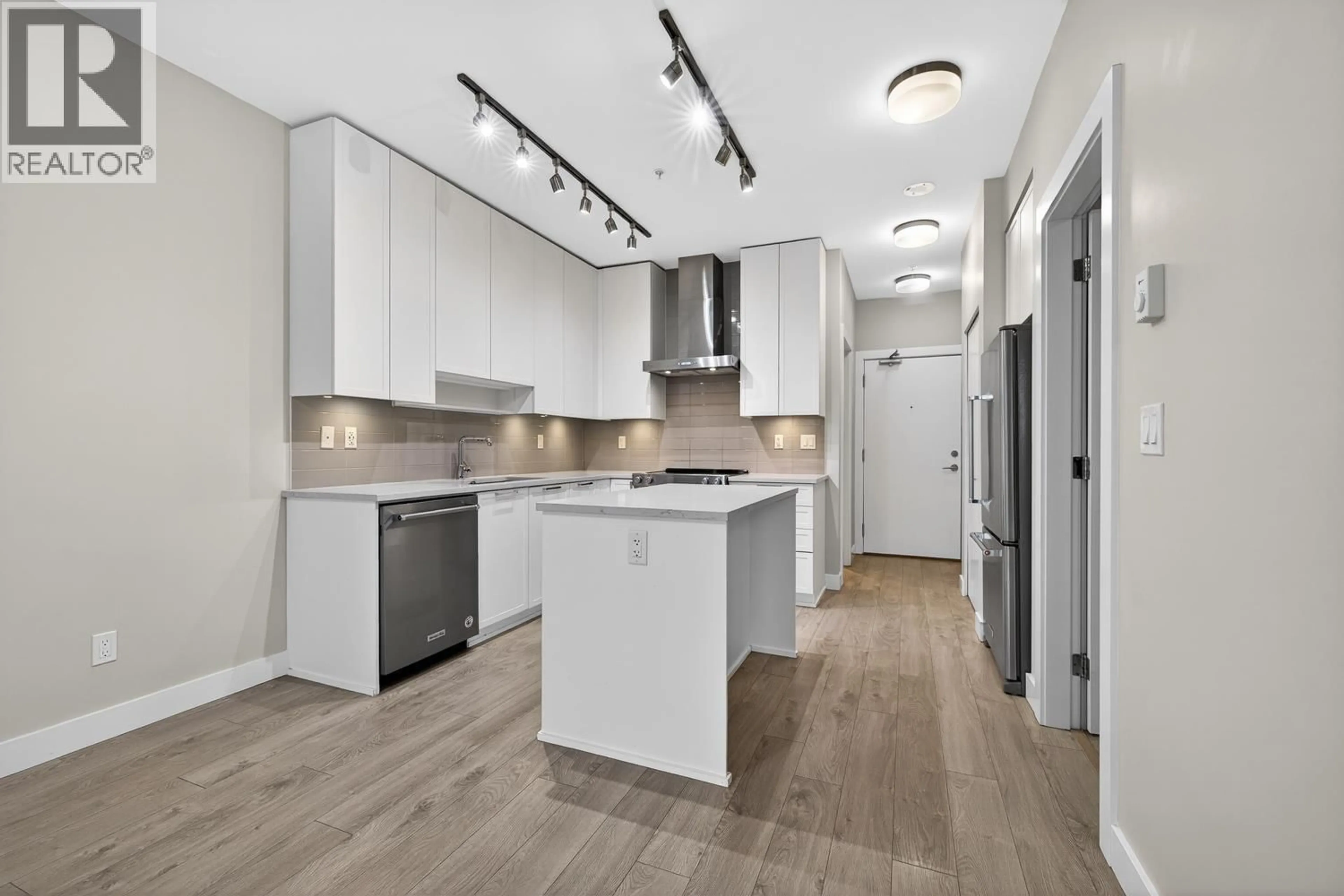 Open concept kitchen, unknown for 303 - 1728 GILMORE AVENUE, Burnaby British Columbia V5C0L3