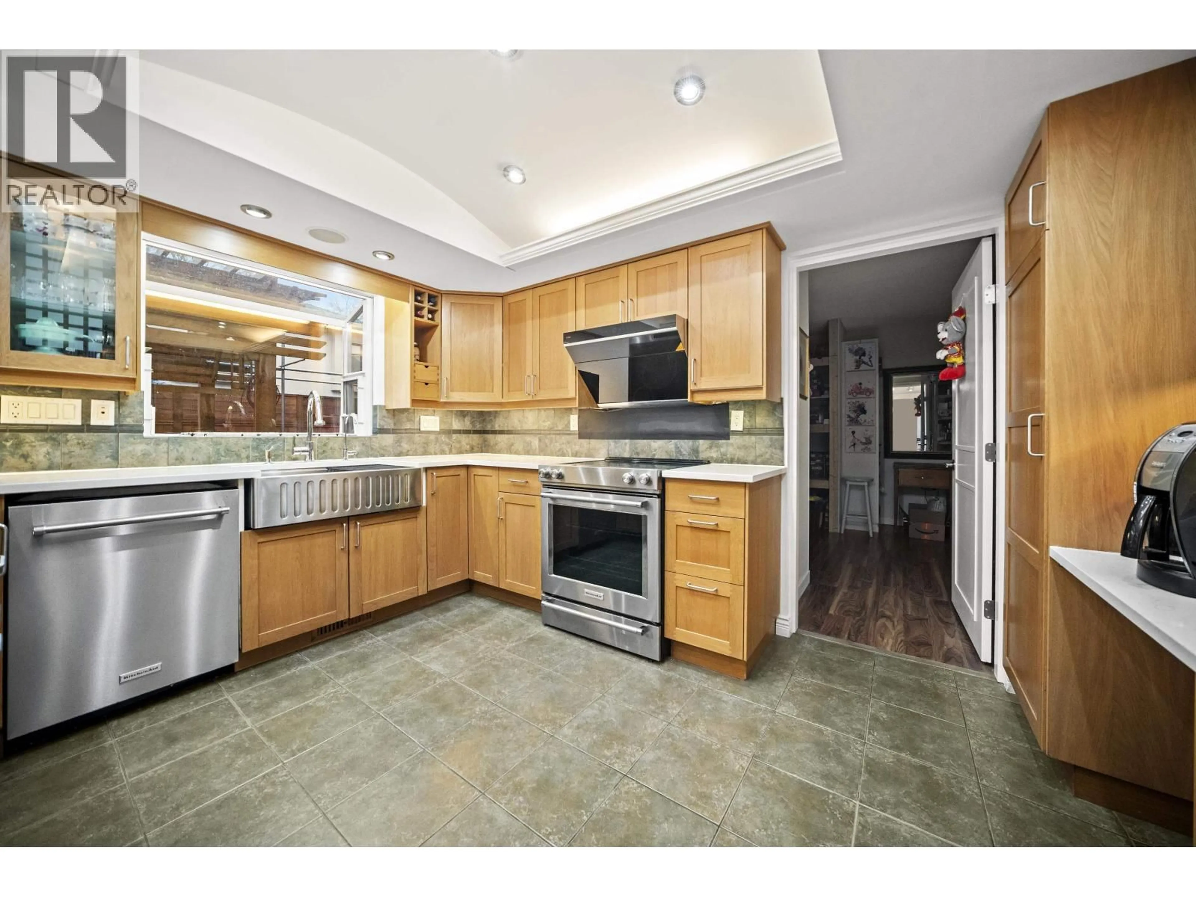 Open concept kitchen, ceramic/tile floor for 7831 MALAHAT AVENUE, Richmond British Columbia V7A4H3