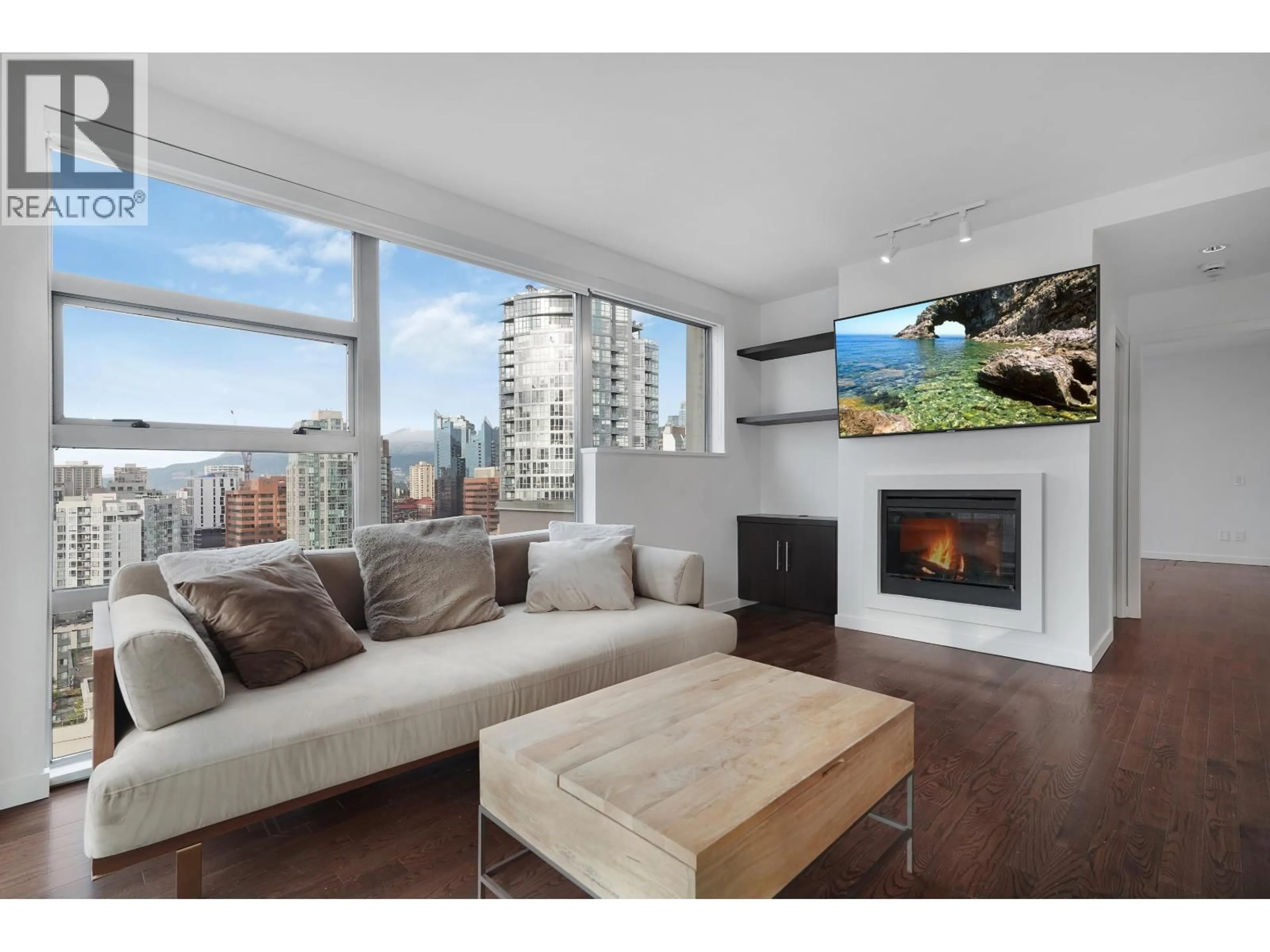 Living room with furniture, wood/laminate floor for 2404 - 1225 RICHARDS STREET, Vancouver British Columbia V6B1E6