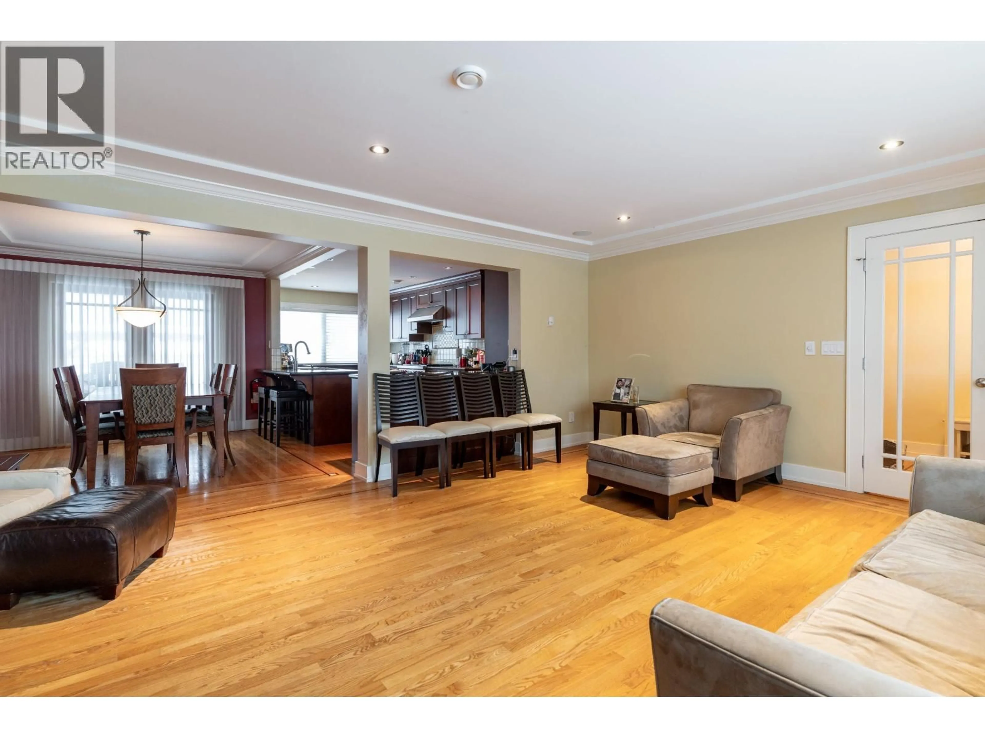 Living room with furniture, wood/laminate floor for 5570 BAILLIE STREET, Vancouver British Columbia V5Z3M8