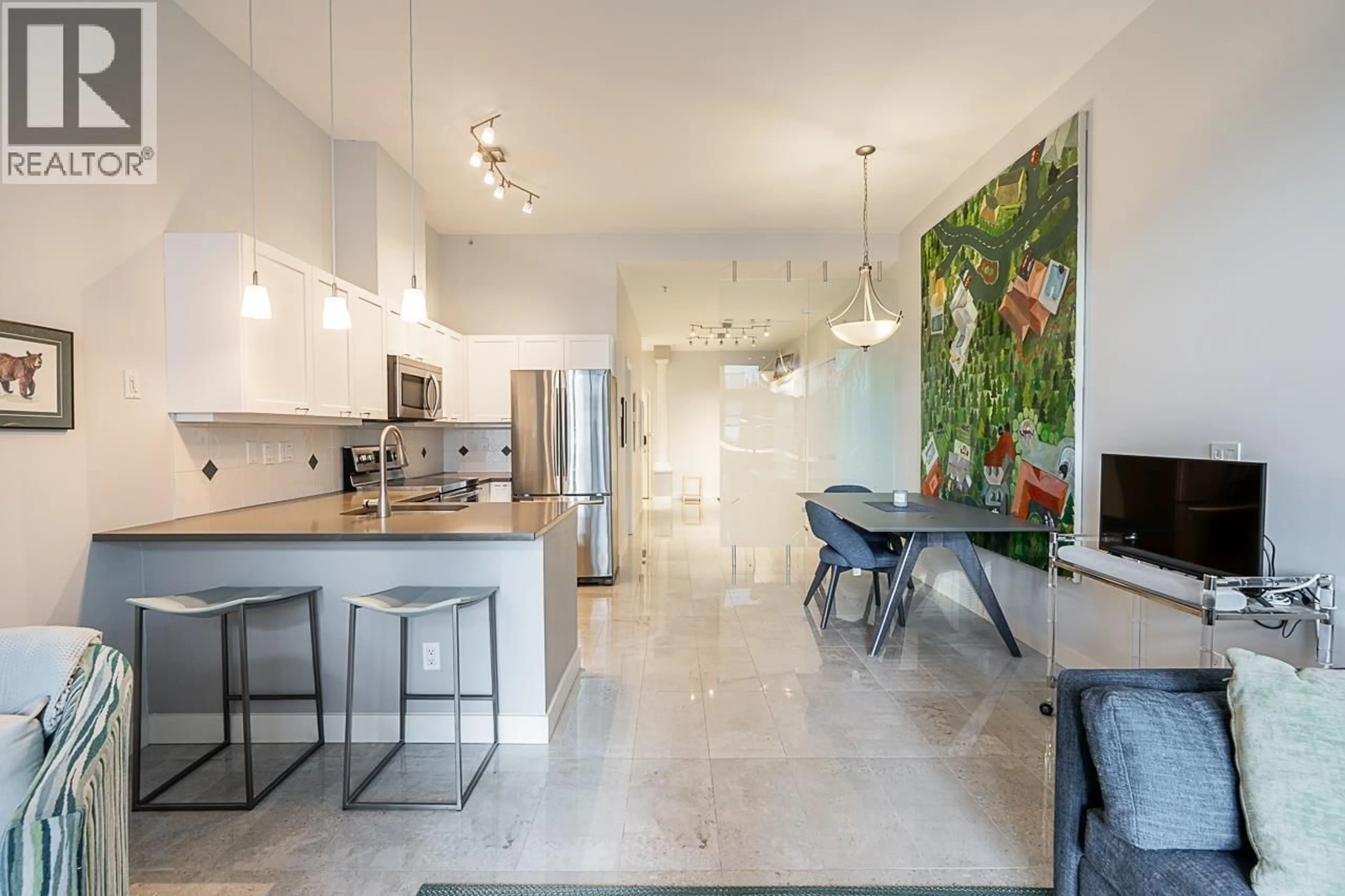 Open concept kitchen, ceramic/tile floor for 108 - 131 3RD STREET, North Vancouver British Columbia V7M1E7