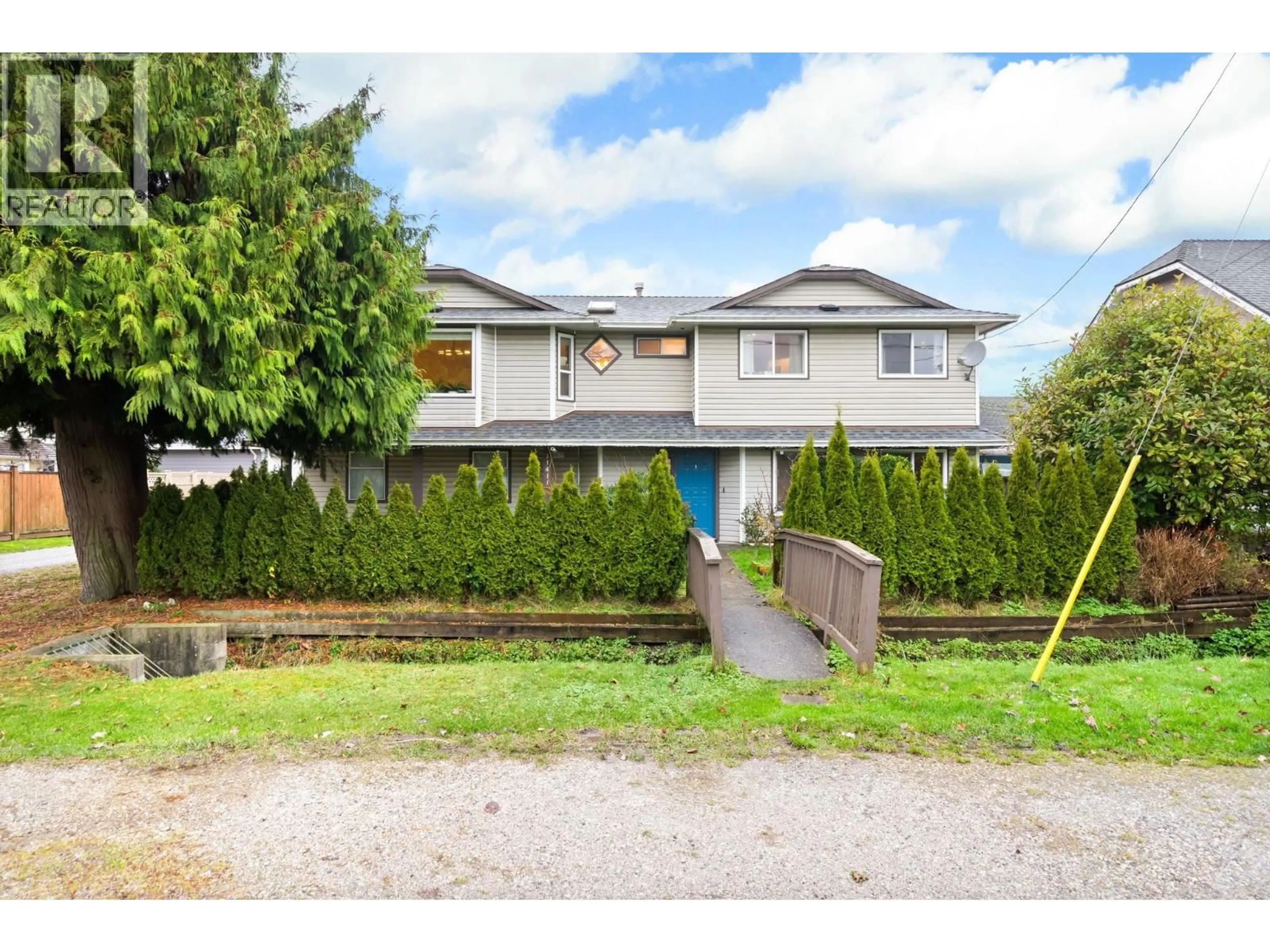A pic from outside/outdoor area/front of a property/back of a property/a pic from drone, street for 11411 2ND AVENUE, Richmond British Columbia V7E3K8