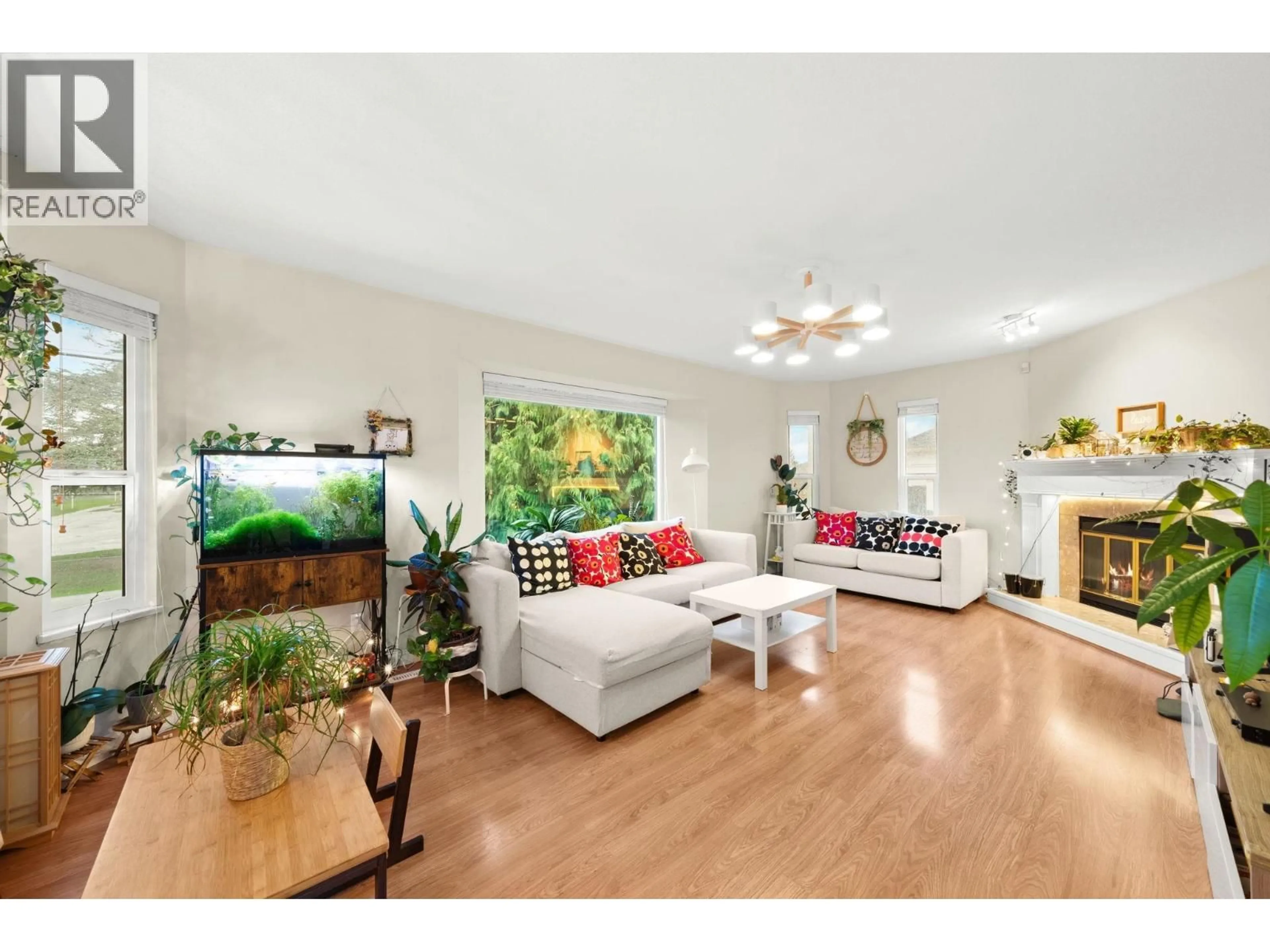 Living room with furniture, wood/laminate floor for 11411 2ND AVENUE, Richmond British Columbia V7E3K8