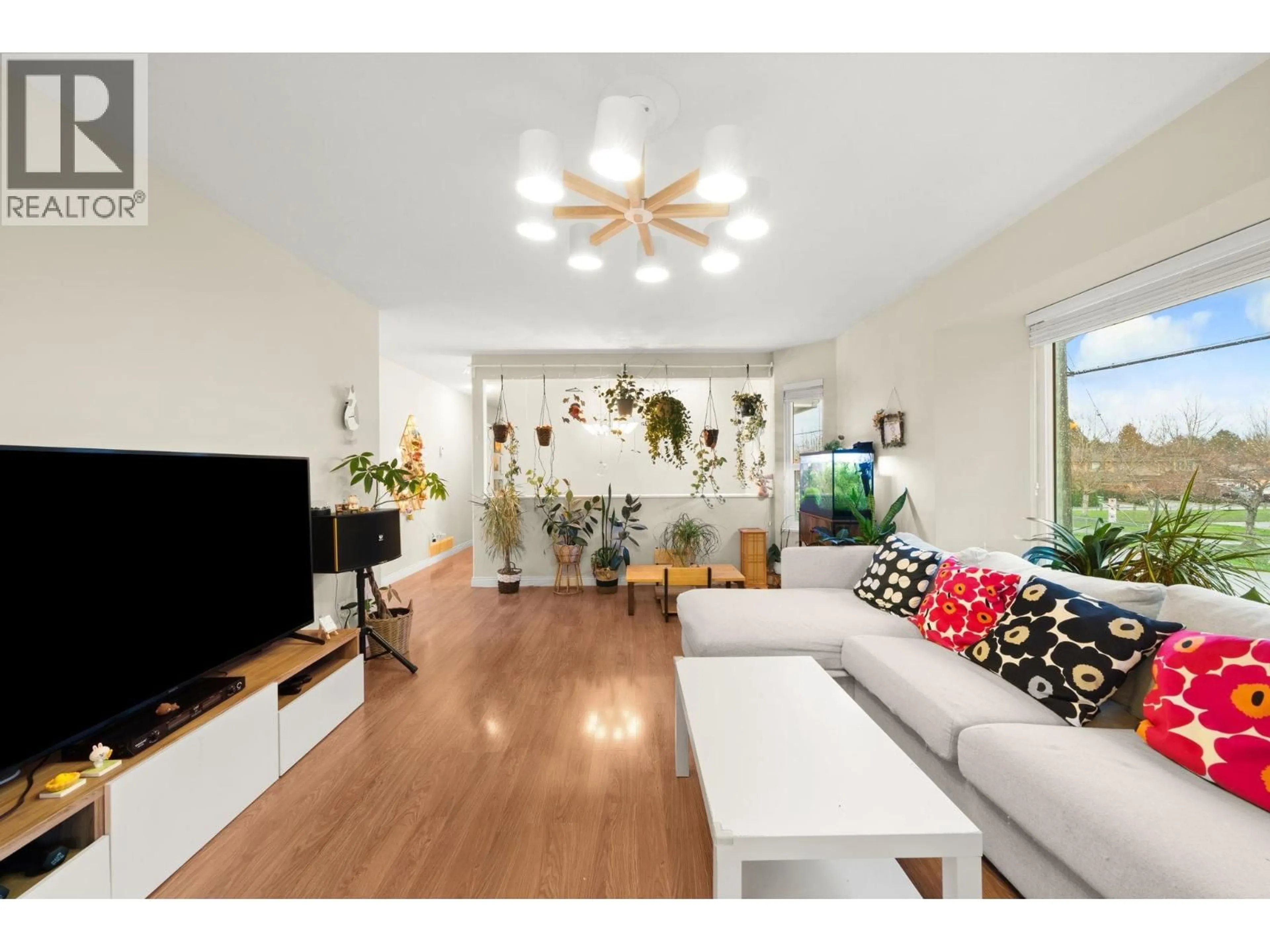 Living room with furniture, wood/laminate floor for 11411 2ND AVENUE, Richmond British Columbia V7E3K8