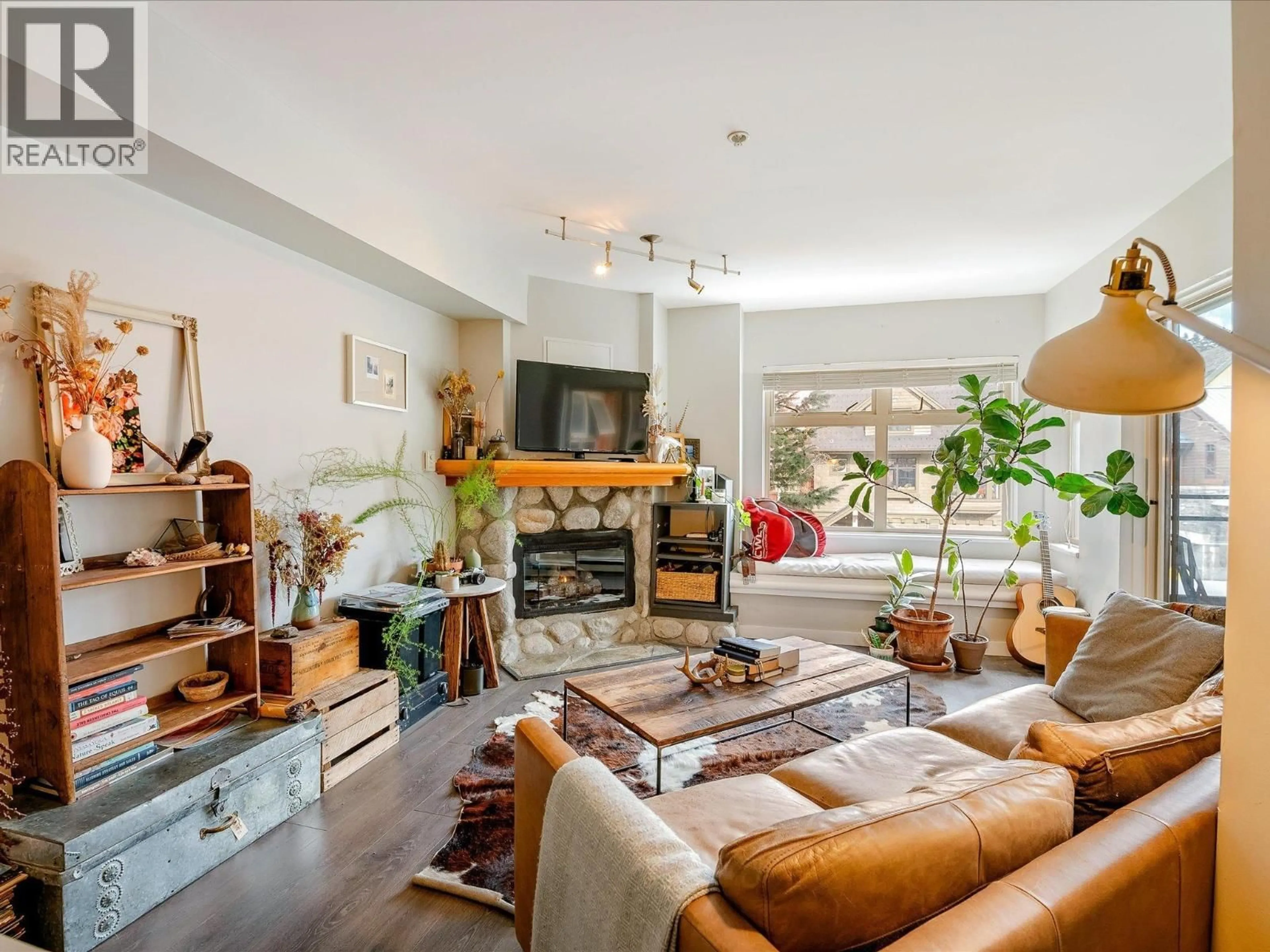 Living room with furniture, unknown for 211 - 2050 LAKE PLACID ROAD, Whistler British Columbia V0N1B2