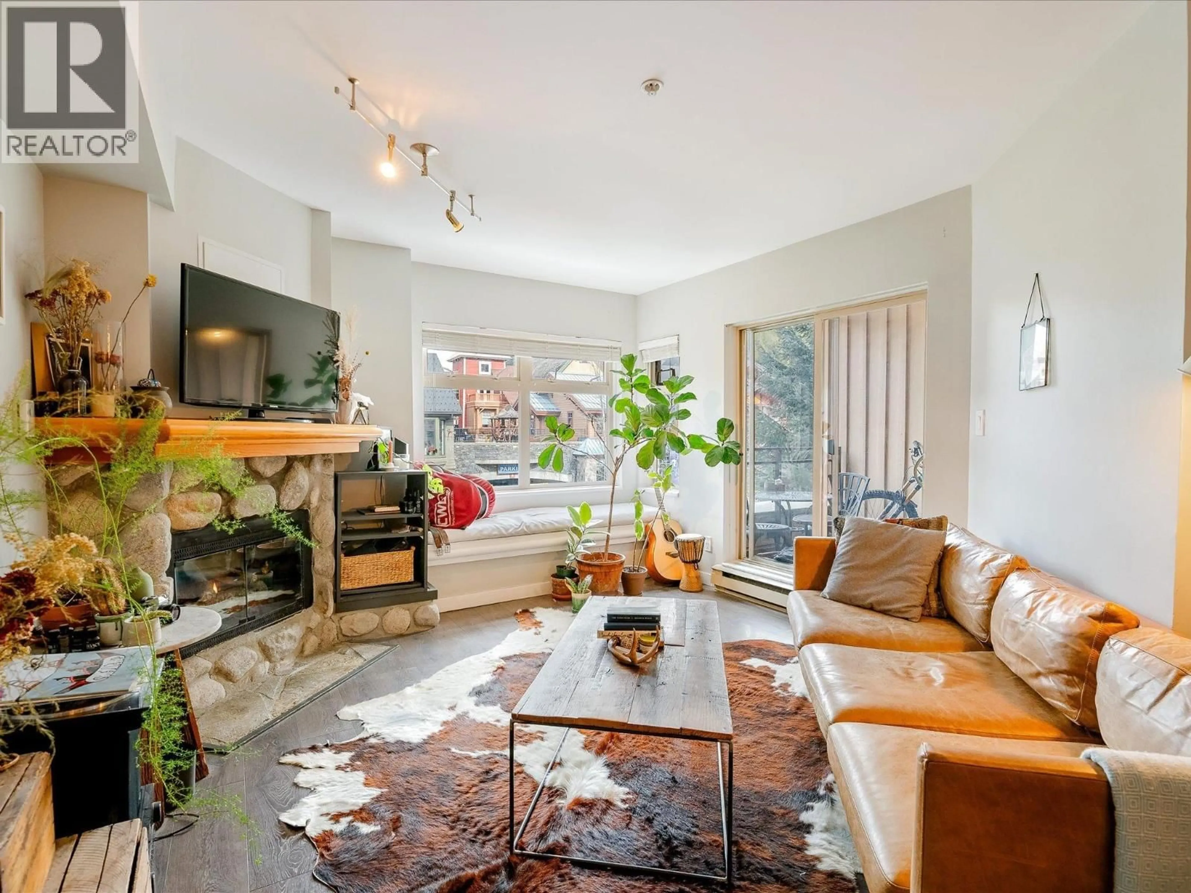 Living room with furniture, unknown for 211 - 2050 LAKE PLACID ROAD, Whistler British Columbia V0N1B2