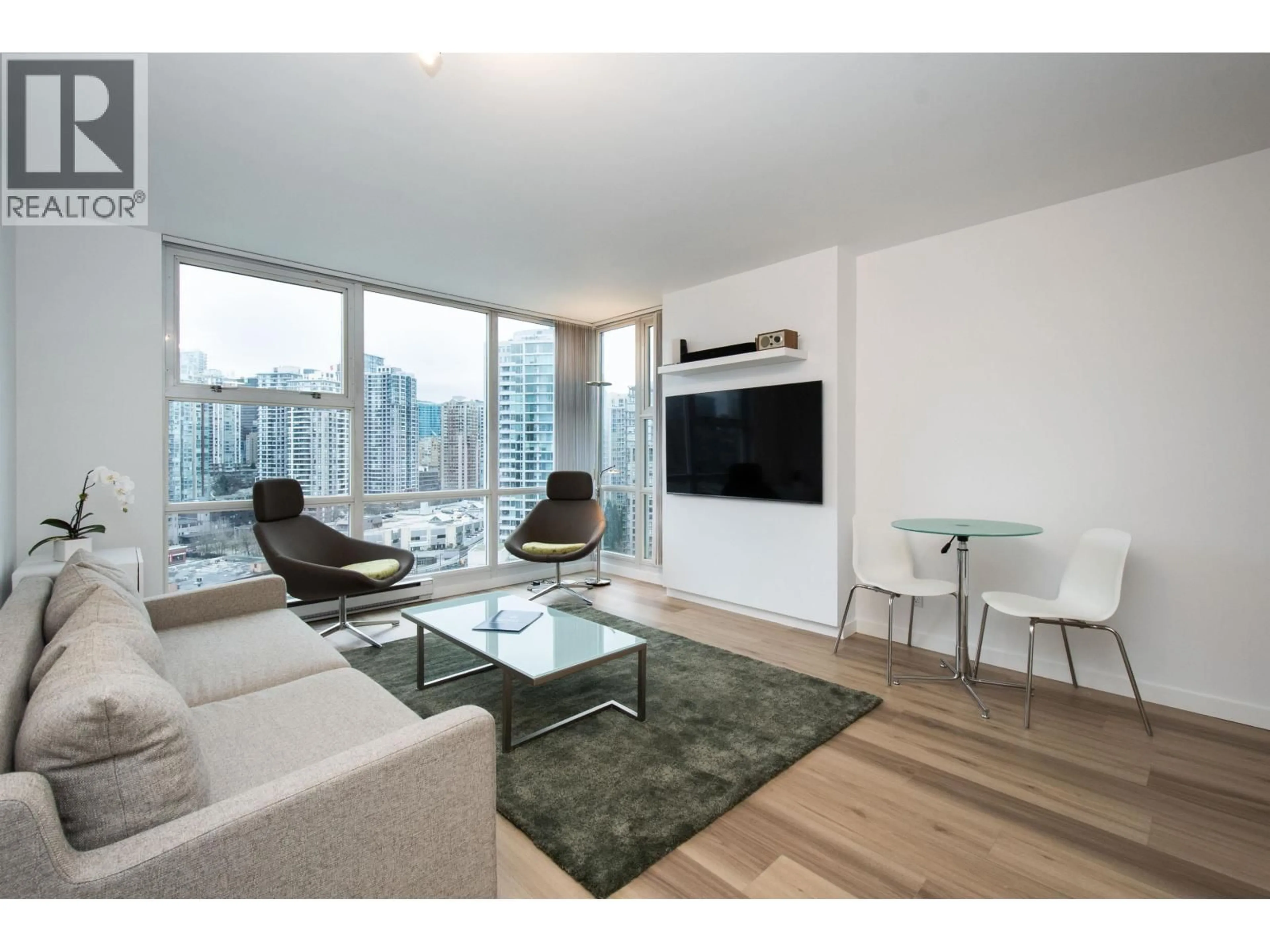 Living room with furniture, wood/laminate floor for 2105 - 193 AQUARIUS MEWS, Vancouver British Columbia V6Z2Z2
