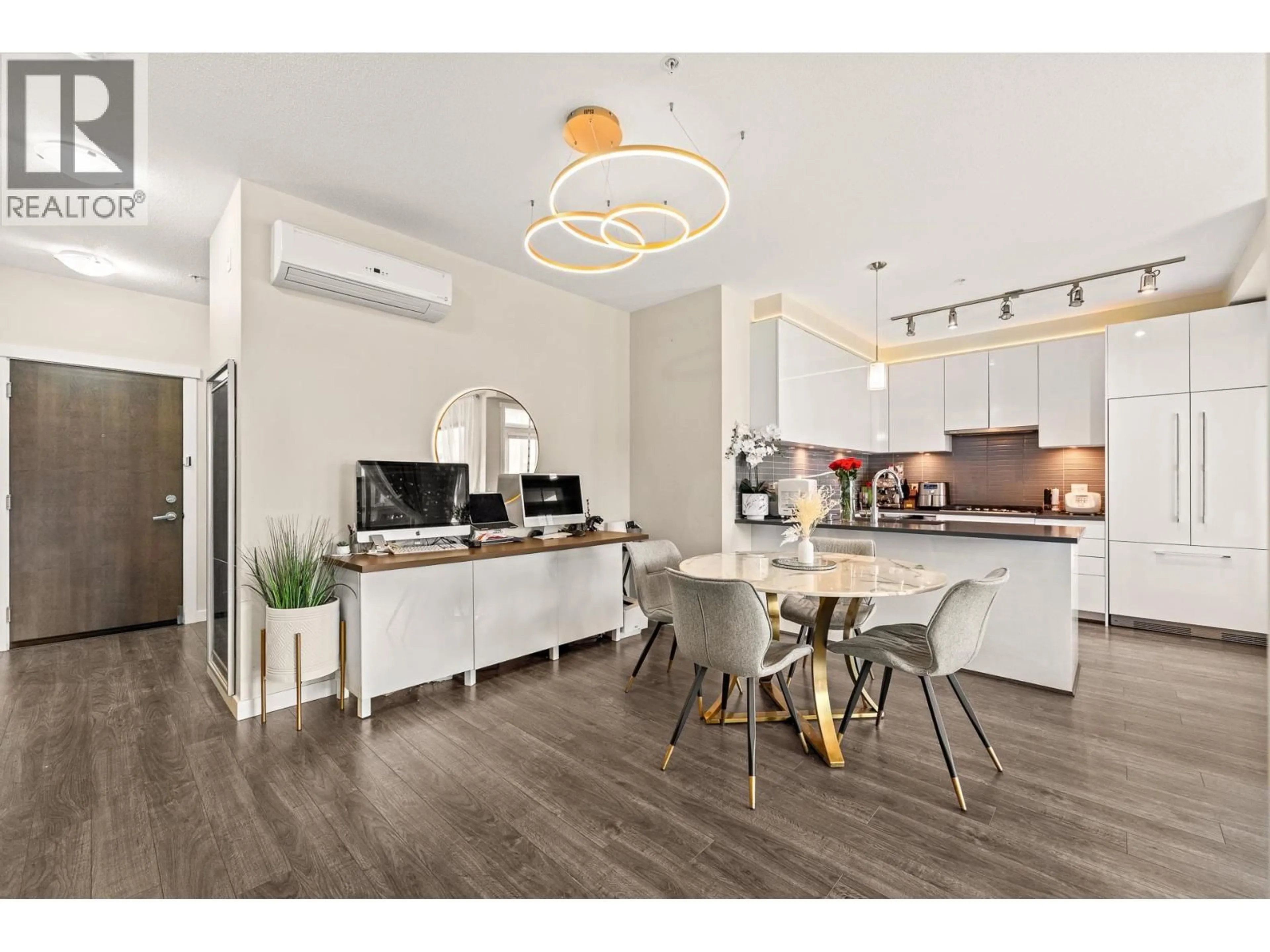 Open concept kitchen, wood/laminate floor for 215 - 9388 TOMICKI AVENUE, Richmond British Columbia V6X0P1