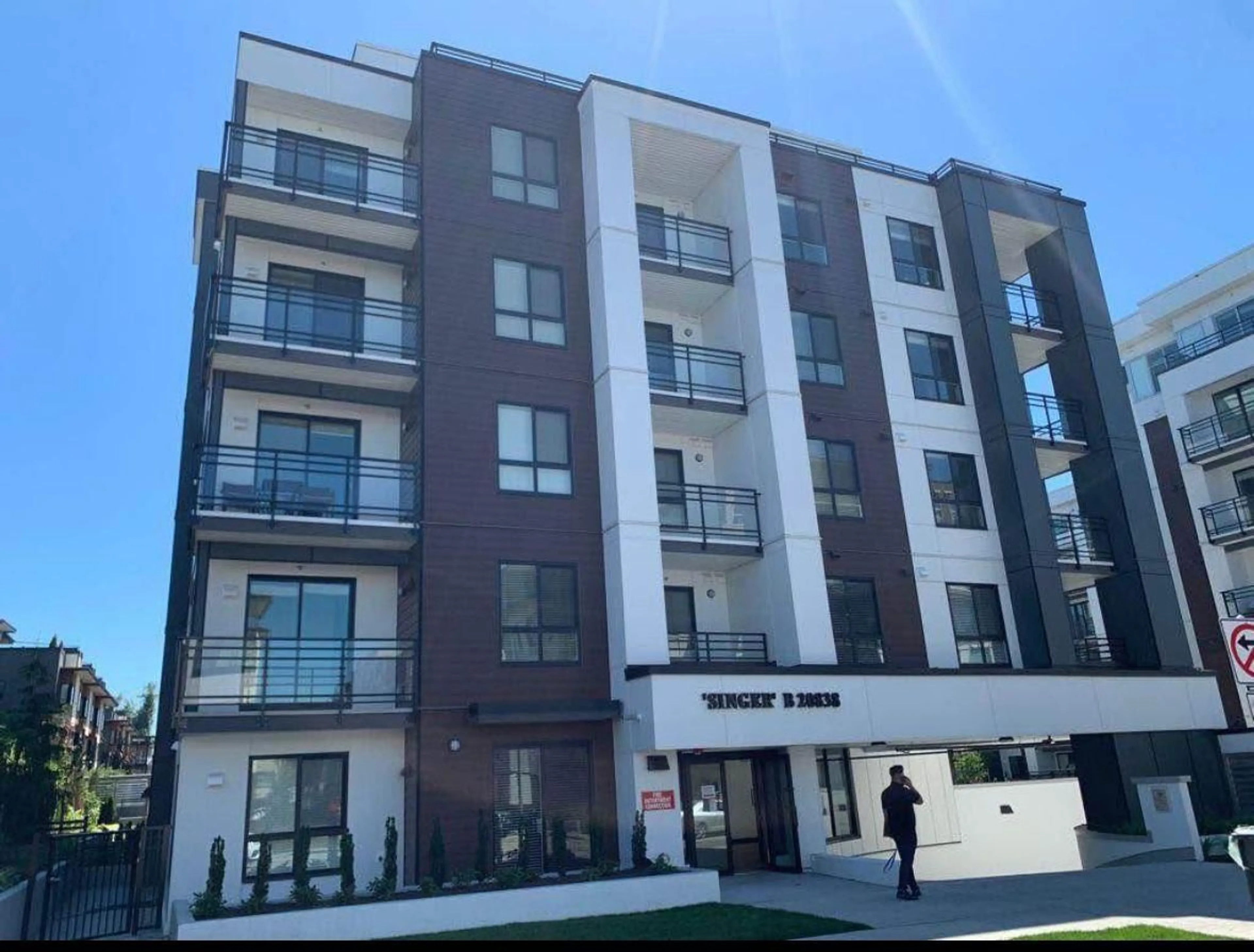 A pic from outside/outdoor area/front of a property/back of a property/a pic from drone, street for B102 - 20838 78B AVENUE, Langley British Columbia V2Y3M2