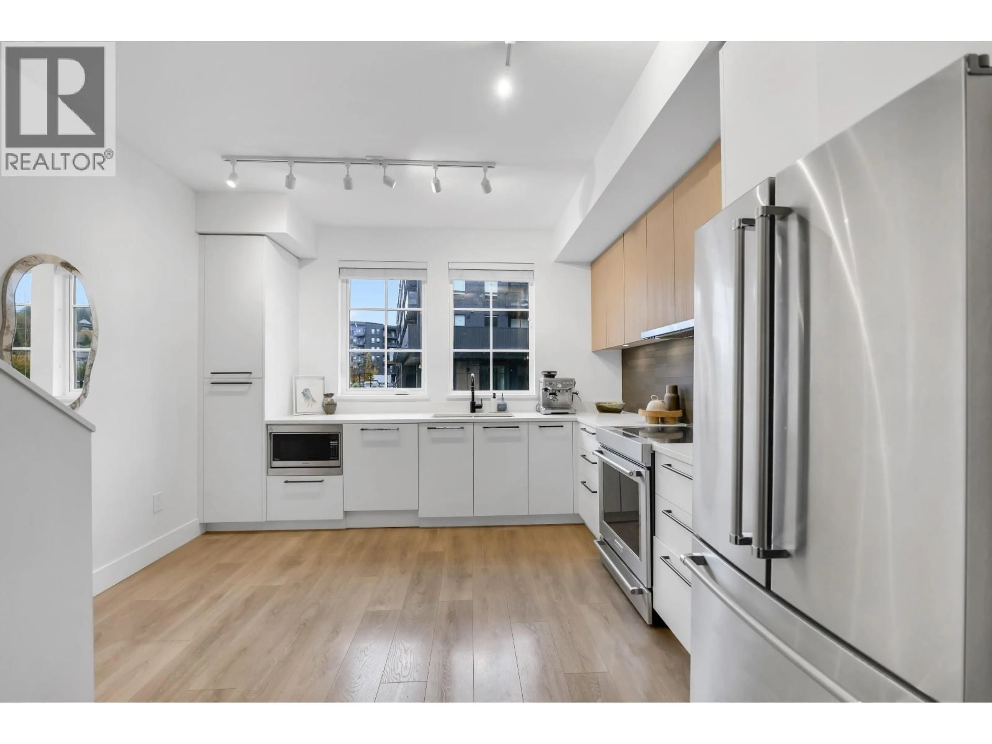 Open concept kitchen, unknown for 1379 MARINASIDE PLACE, Squamish British Columbia V8B1A8