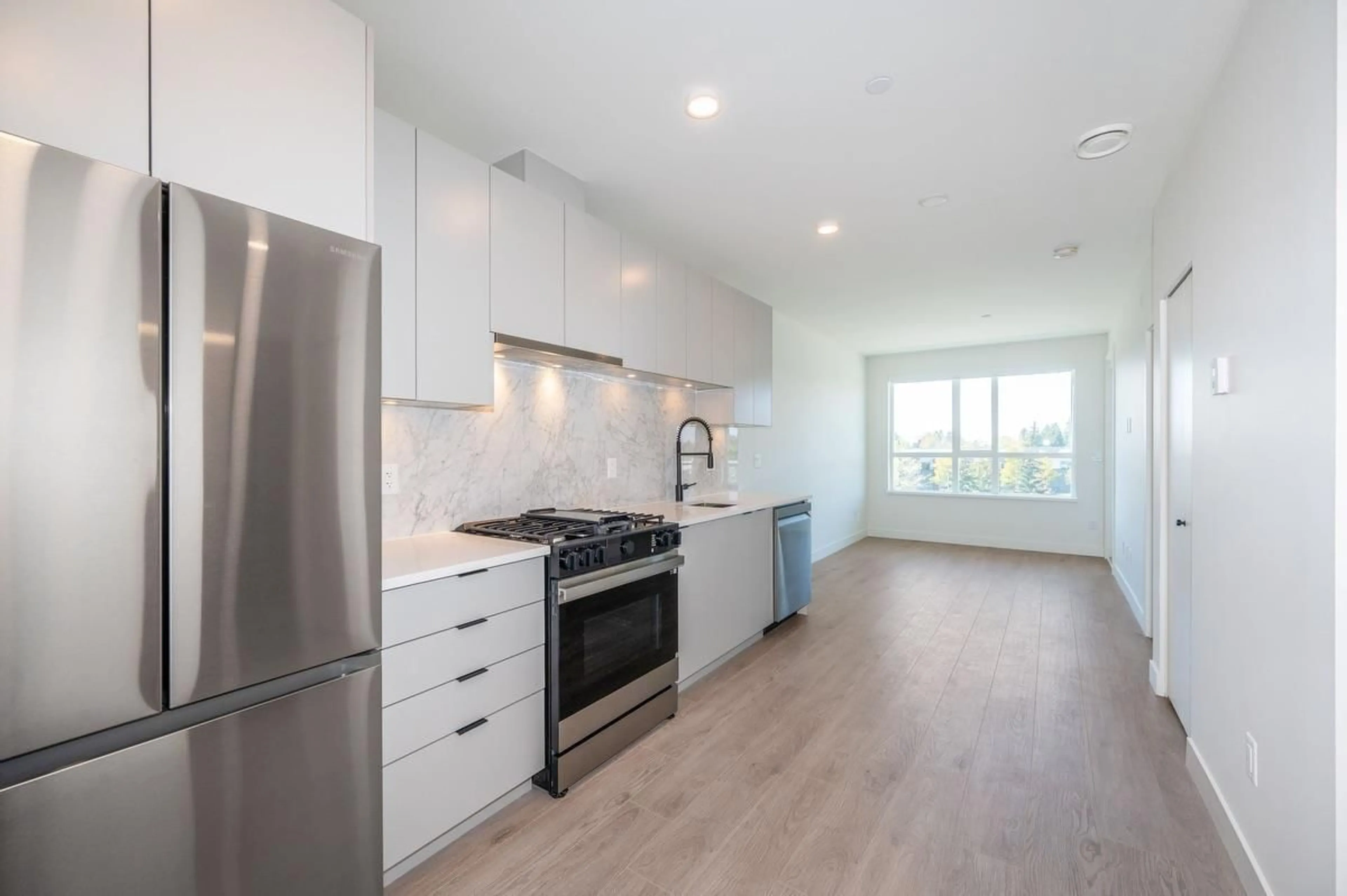 Open concept kitchen, unknown for 509 - 13238 105TH AVENUE, Surrey British Columbia V3T0W1