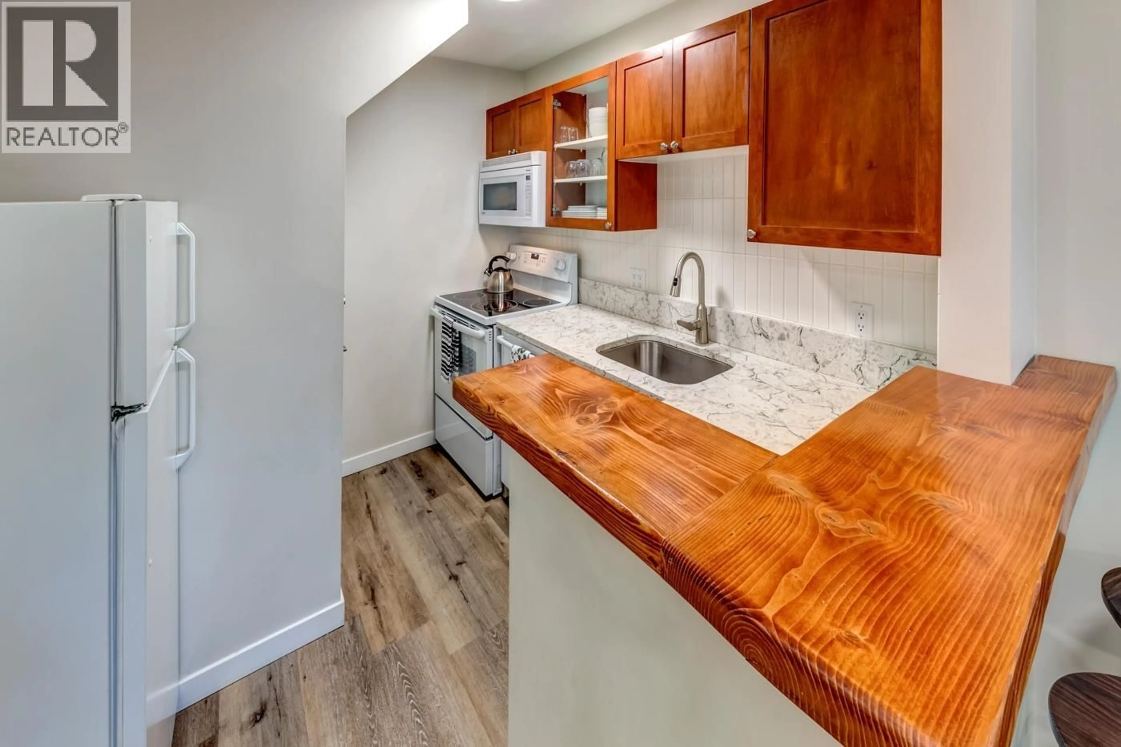 Standard kitchen, wood/laminate floor for 44 - 4388 NORTHLANDS BOULEVARD, Whistler British Columbia V8E1C6
