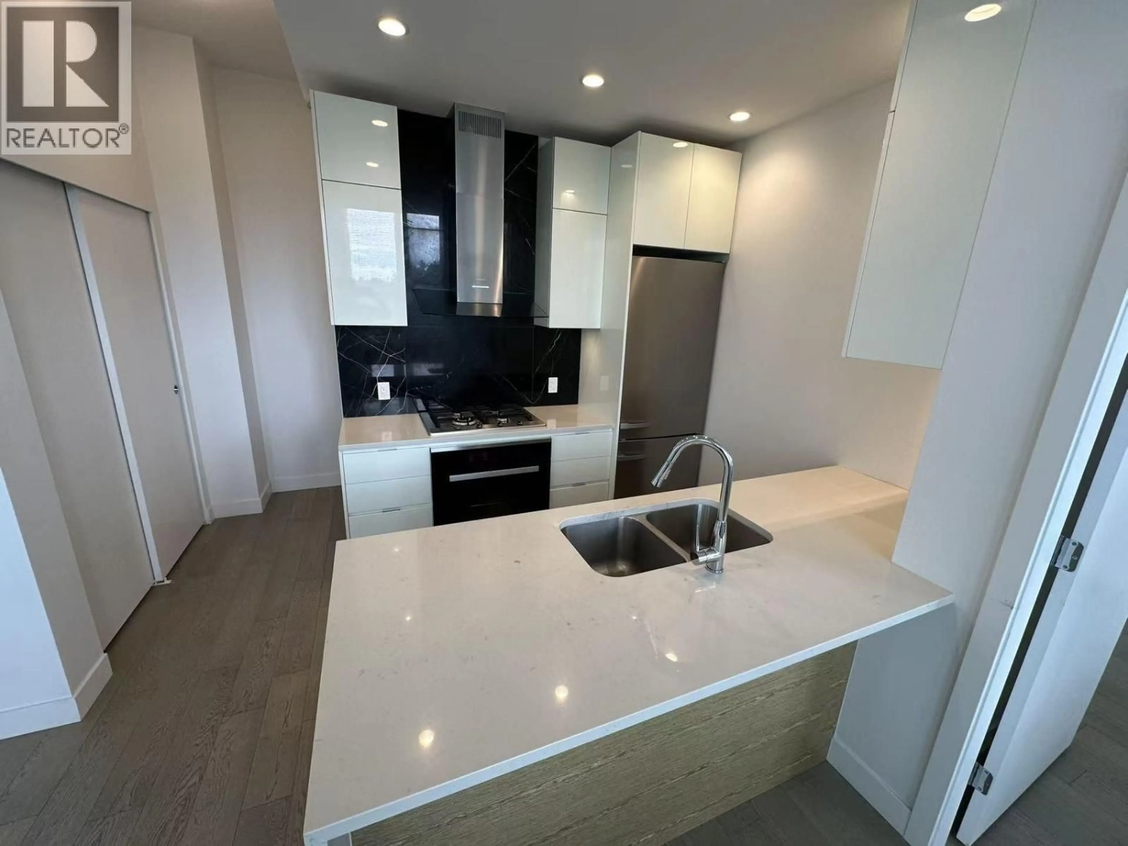 Standard kitchen, ceramic/tile floor for 406 - 6733 CAMBIE STREET, Vancouver British Columbia V6P3H1