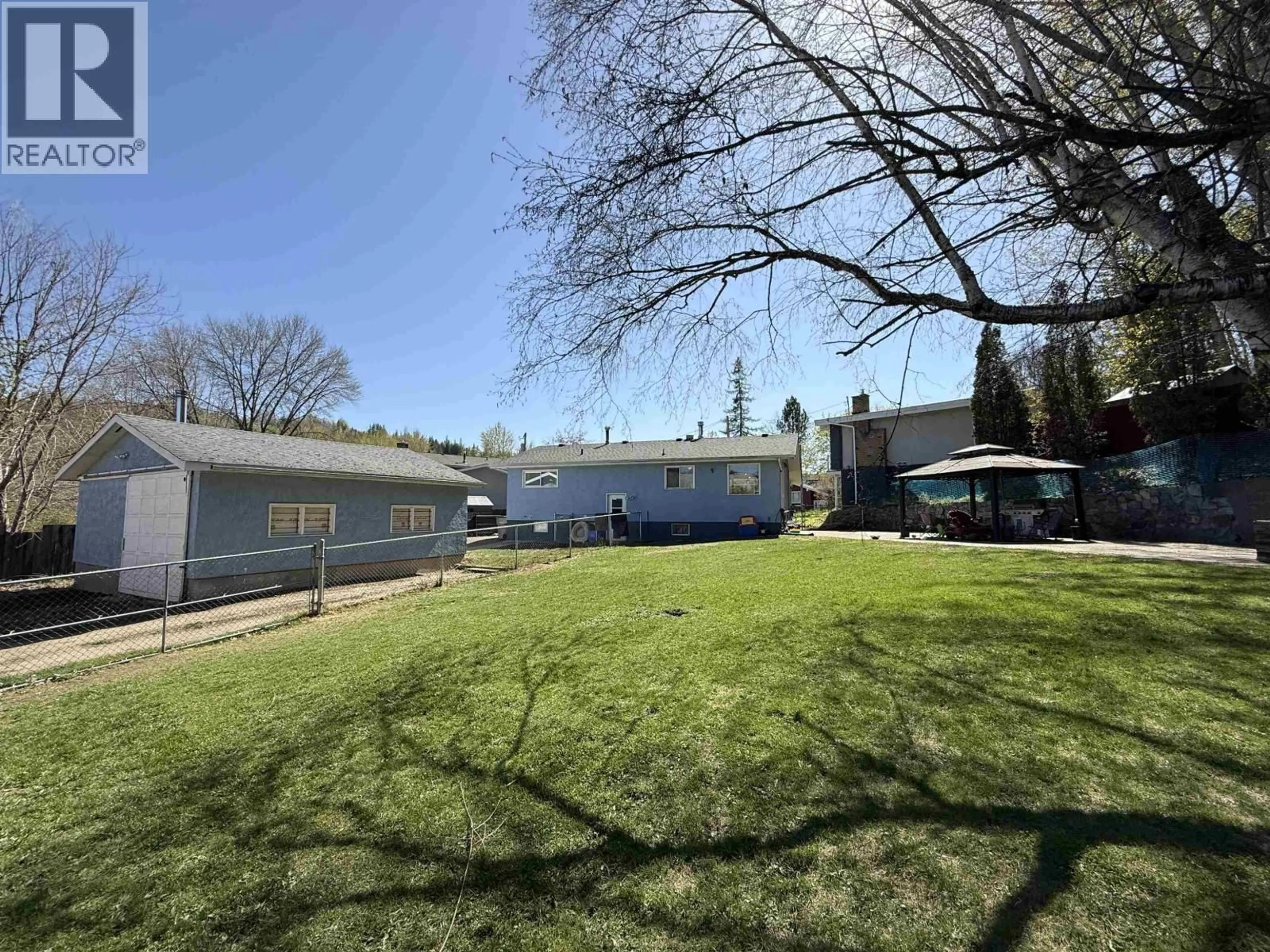 A pic from outside/outdoor area/front of a property/back of a property/a pic from drone, street for 124 LINDSAY STREET, Quesnel British Columbia V2J3E3