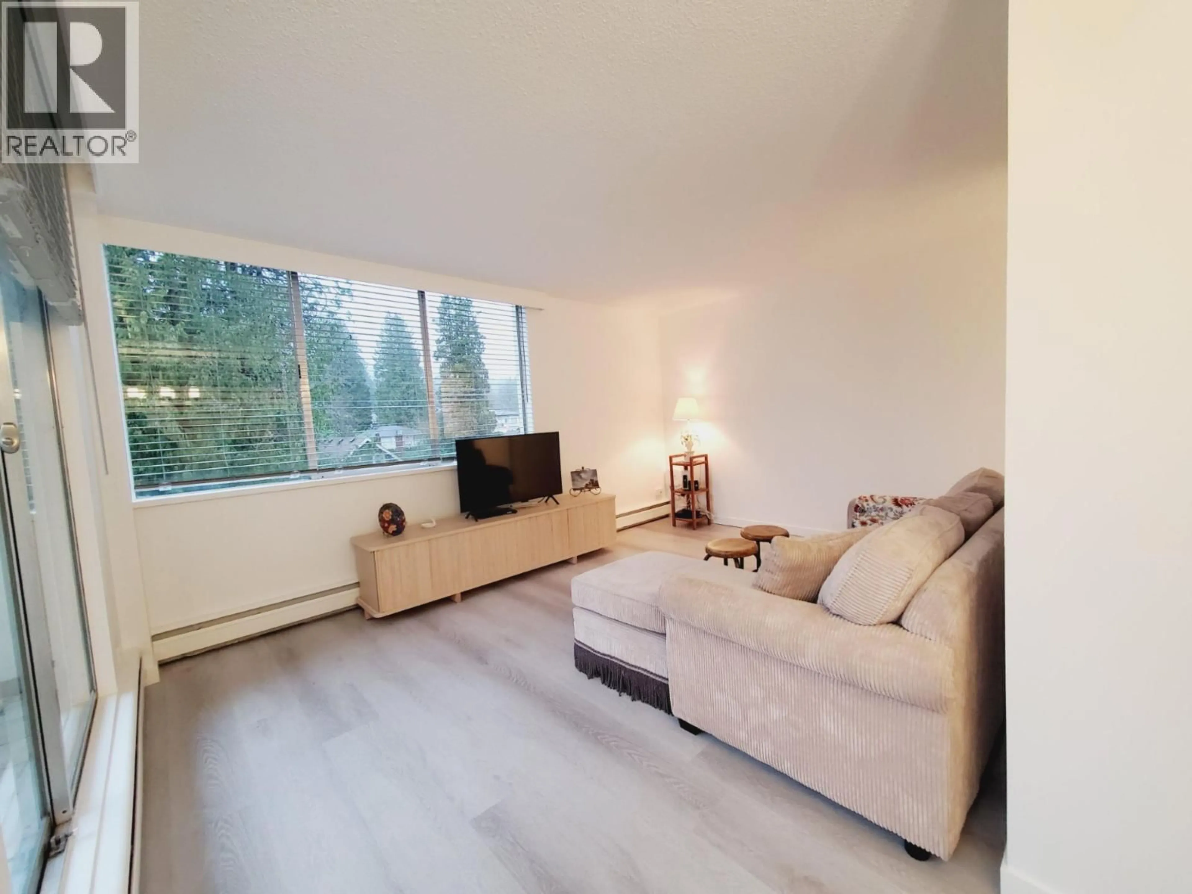 Living room with furniture, floor is not visible for 503 - 1785 ESQUIMALT AVENUE, West Vancouver British Columbia V7V1R7