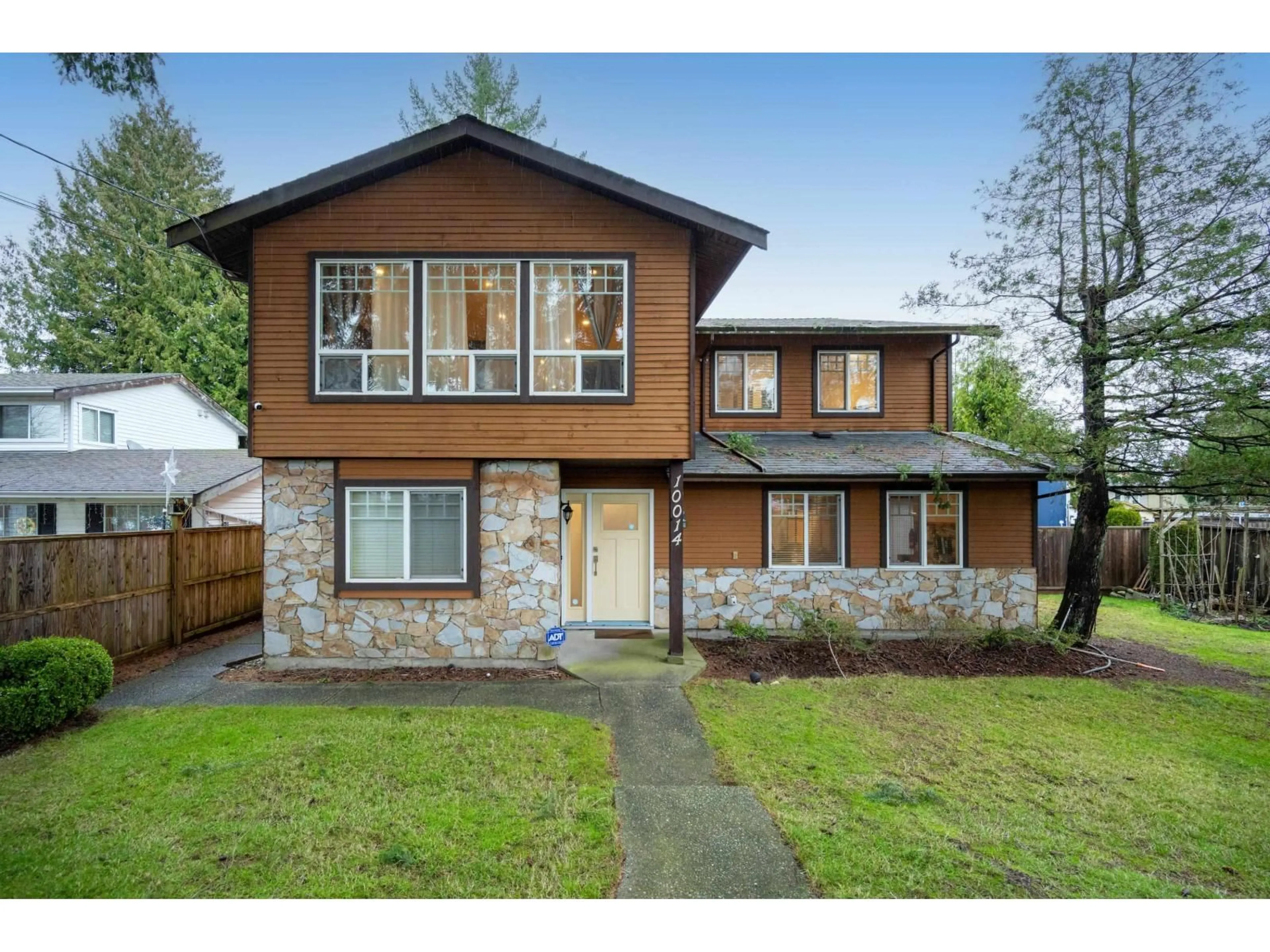 Home with brick exterior material, street for 10014 156 STREET, Surrey British Columbia V3R4L5