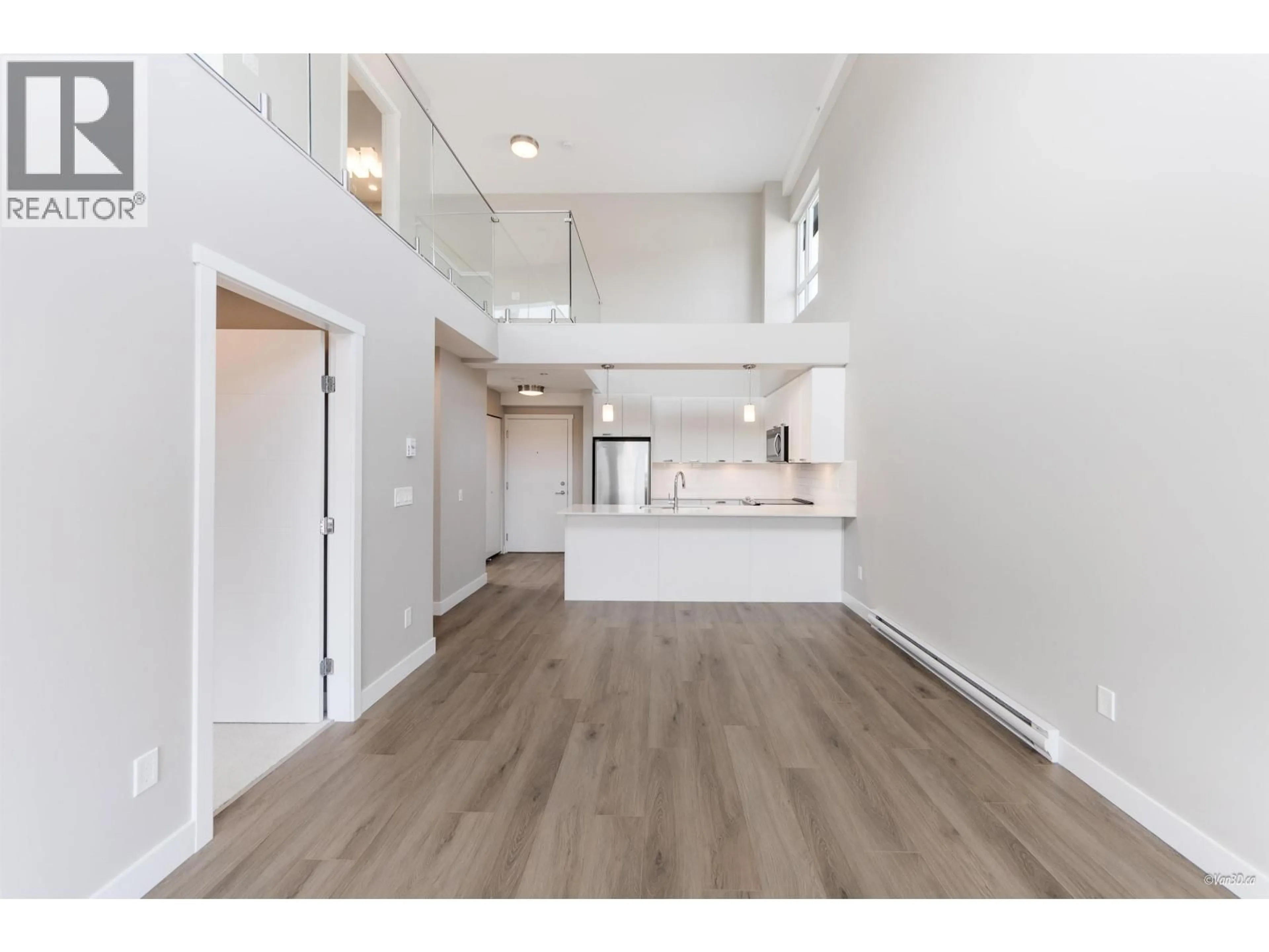 Open concept kitchen, wood/laminate floor for 418 - 22562 121 AVENUE, Maple Ridge British Columbia V2X3Y8