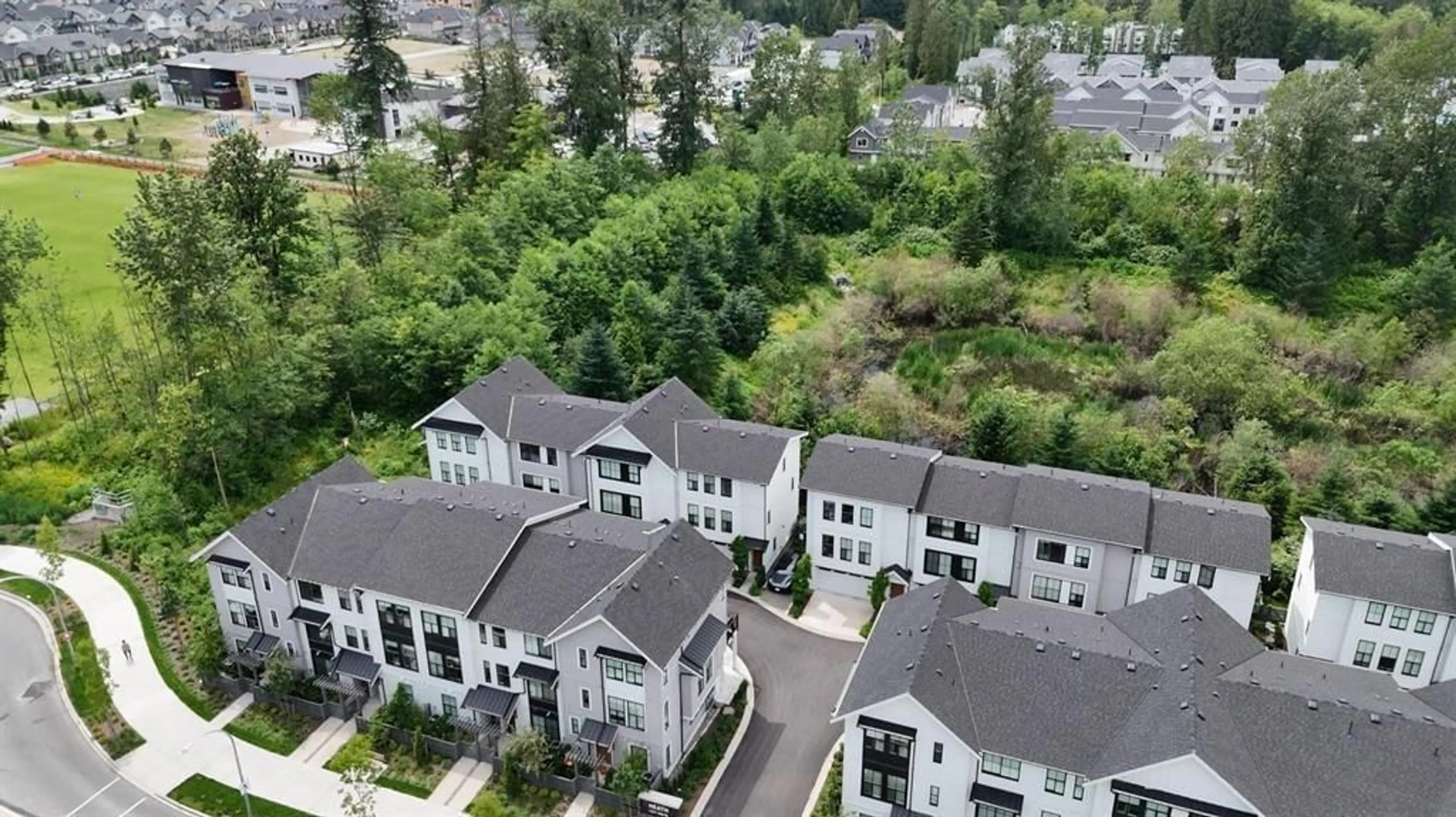 A pic from outside/outdoor area/front of a property/back of a property/a pic from drone, city buildings view from balcony for 4 - 7937 206 STREET, Langley British Columbia V2Y1X6