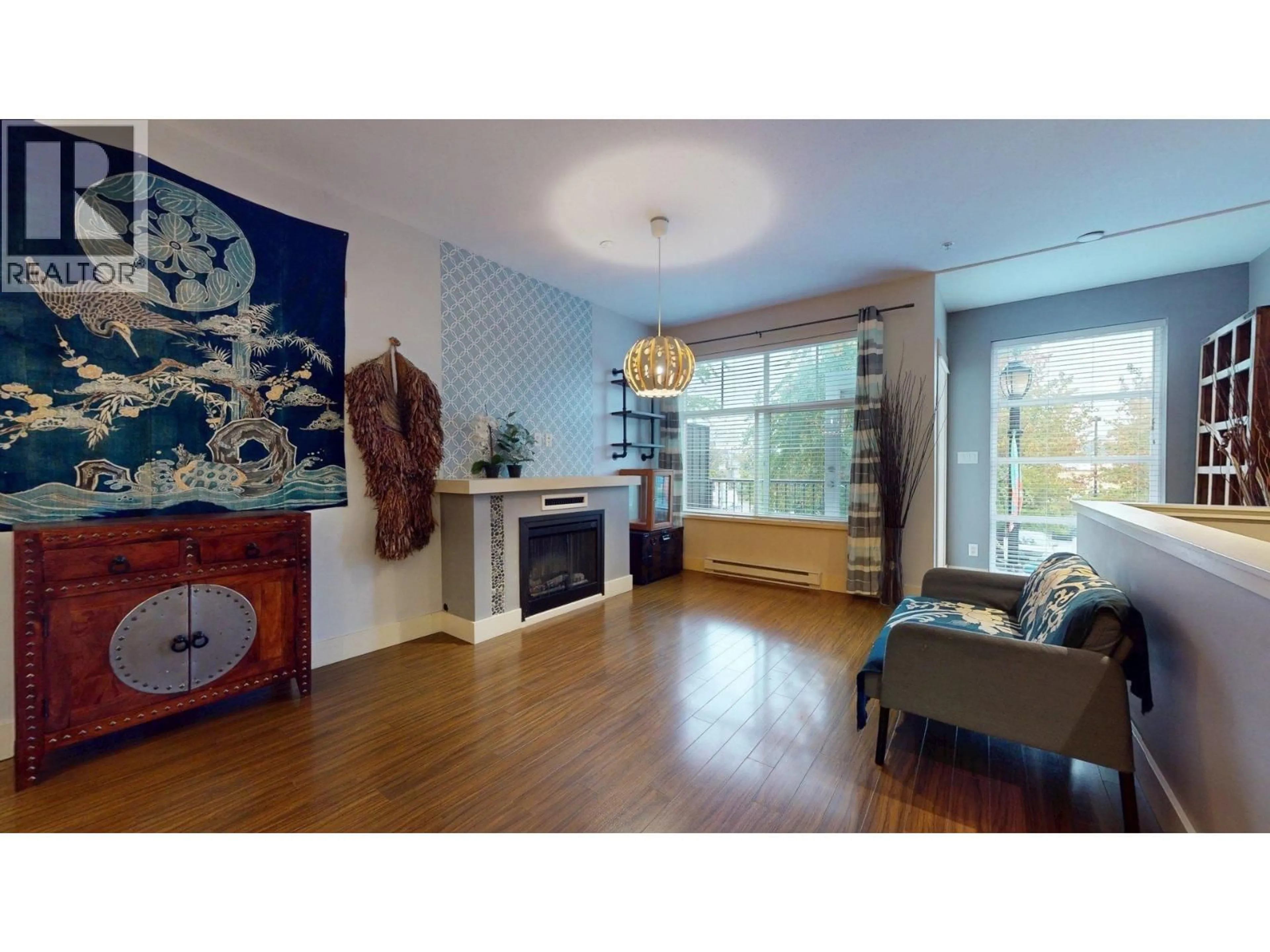 Living room with furniture, wood/laminate floor for 1320 MAIN STREET, Squamish British Columbia V8B0R2