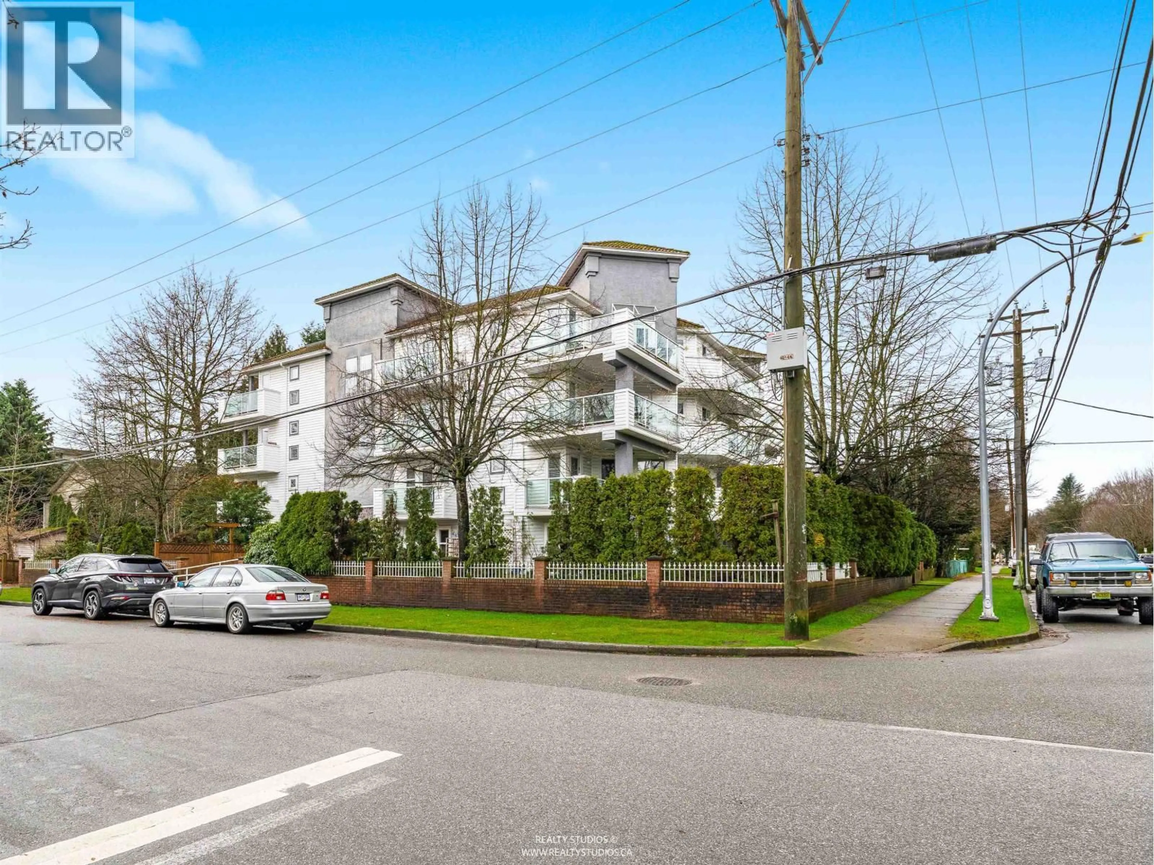 A pic from outside/outdoor area/front of a property/back of a property/a pic from drone, street for 402 - 2983 CAMBRIDGE STREET, Port Coquitlam British Columbia V3B7N7