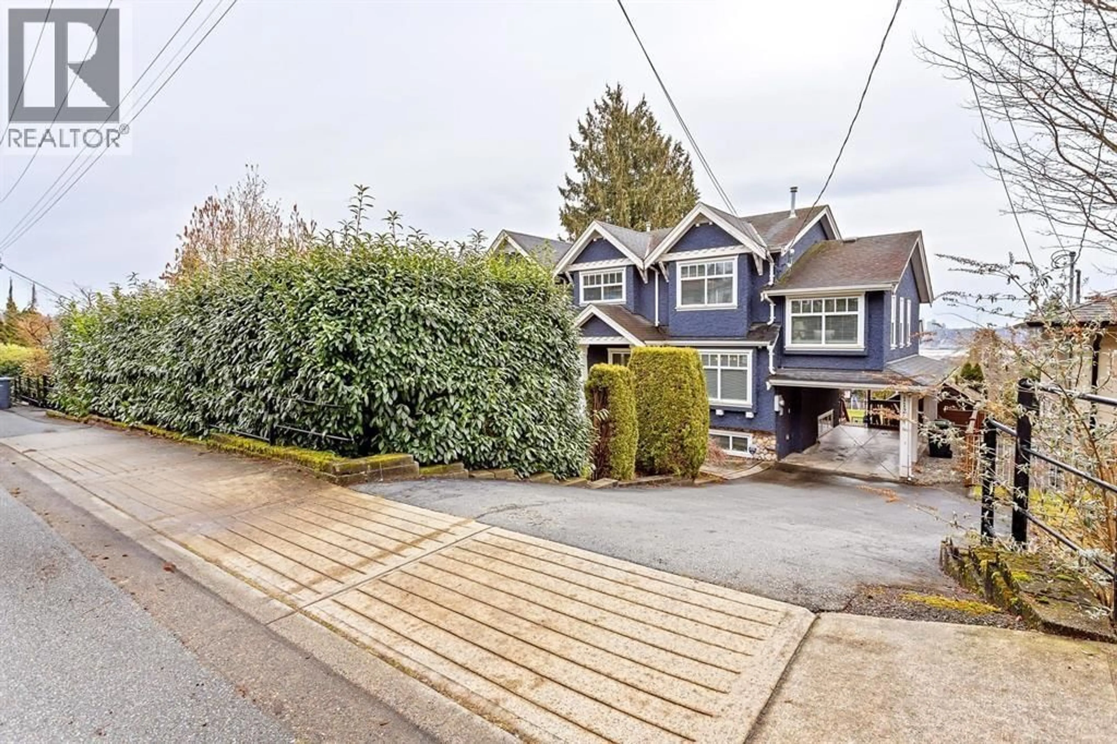 A pic from outside/outdoor area/front of a property/back of a property/a pic from drone, street for 1122 ROCHESTER AVENUE, Coquitlam British Columbia V3K2X4