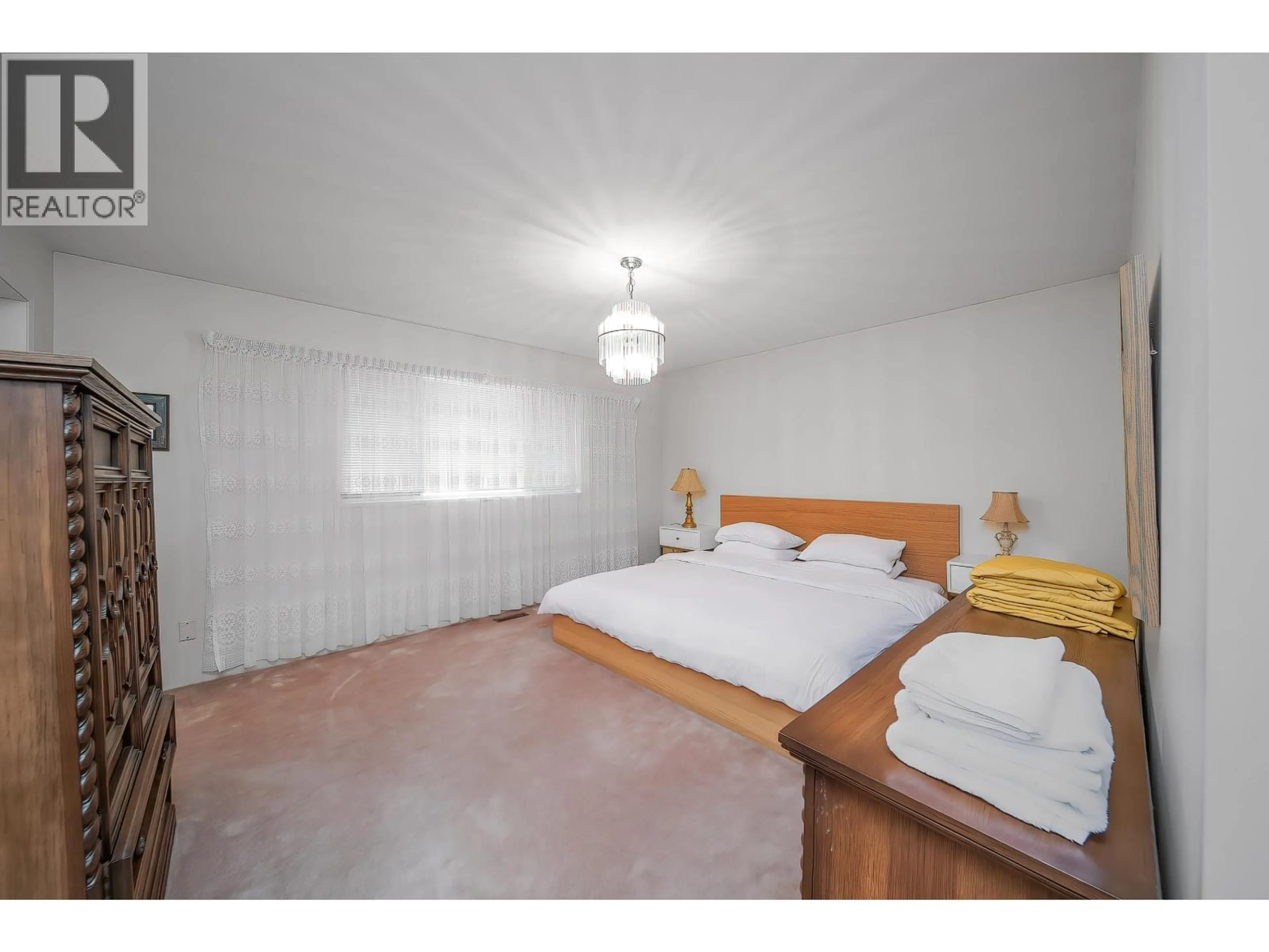 Bedroom with bed, wood/laminate floor for 4837 8A AVENUE, Delta British Columbia V4M1S8